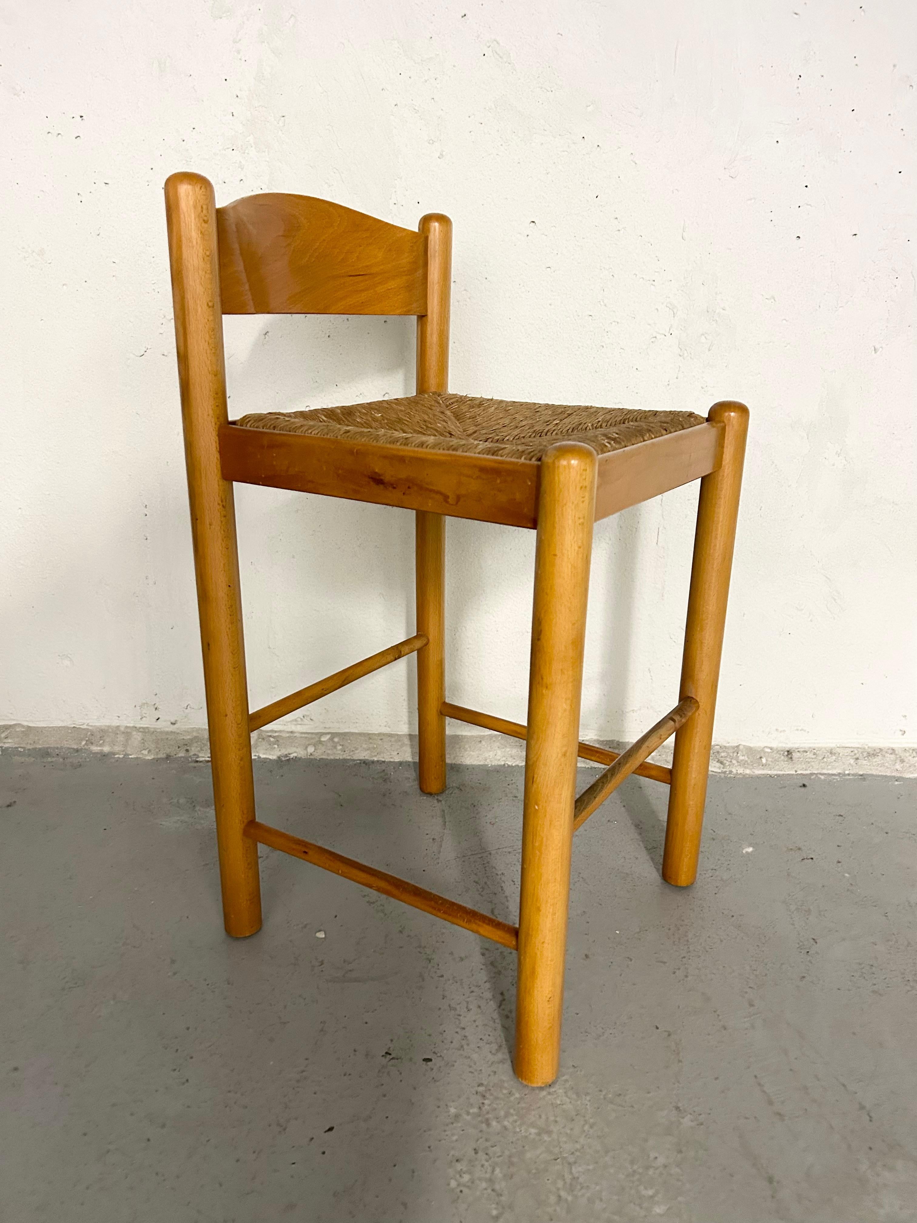 Vintage 1960s wood counter height stool with woven rush seat and cylinder legs. Normal vintage wear. Small marks on wood 