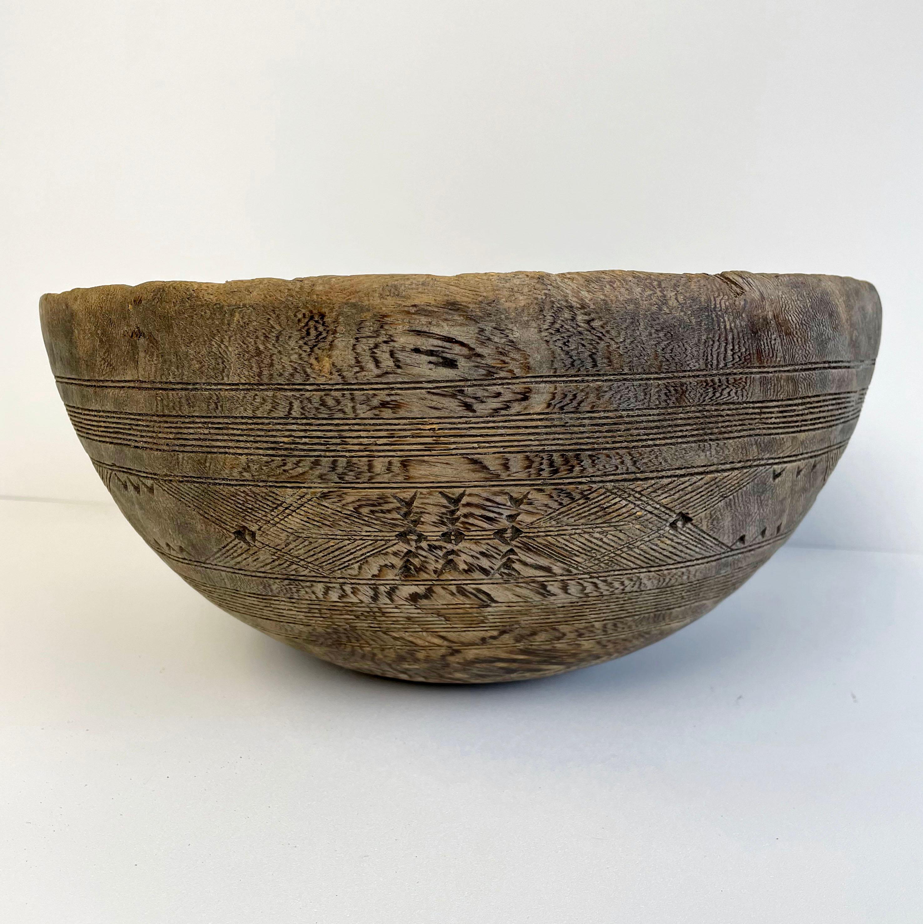 Vintage wood bowl
These vintage green bowls are from Asia and some feature beautiful hand-carved details. This bowl is great for a counter top, or table. Use as a planter, or decorative bowl for accent.

Measures: Approximately 12” diameter , 6”