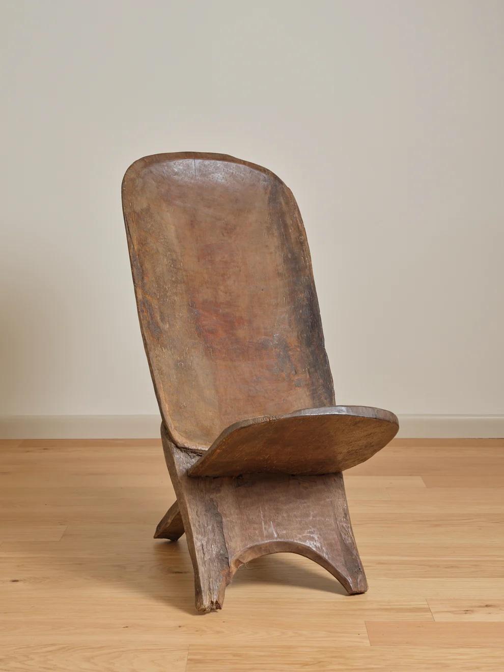 One of a kind vintage wood chair. Comes apart in two pieces. Bird carving detail on the back of the chair.