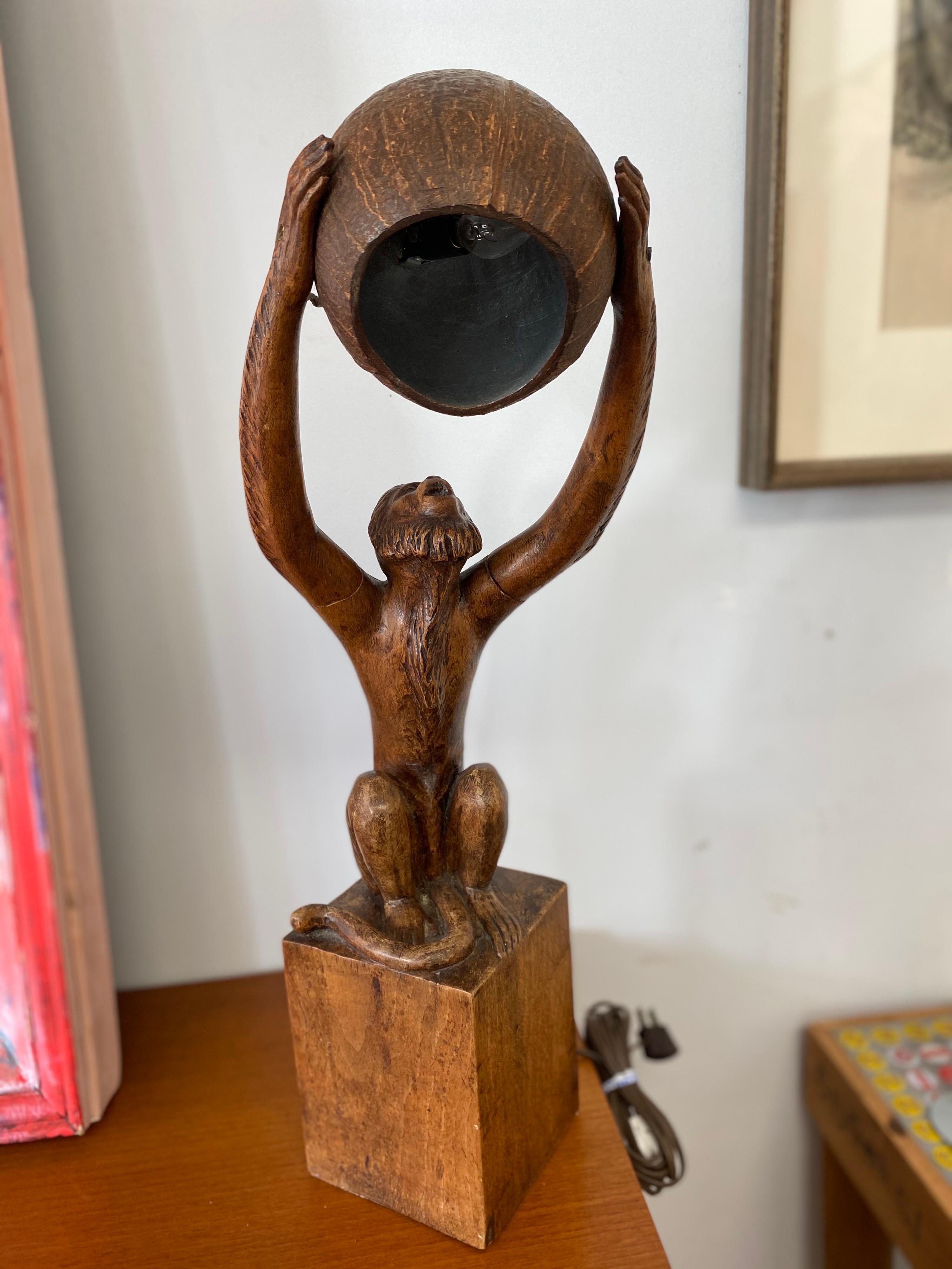 Unique vintage wood carved monkey lamp by P. Gilles. This lamp is in great vintage condition.