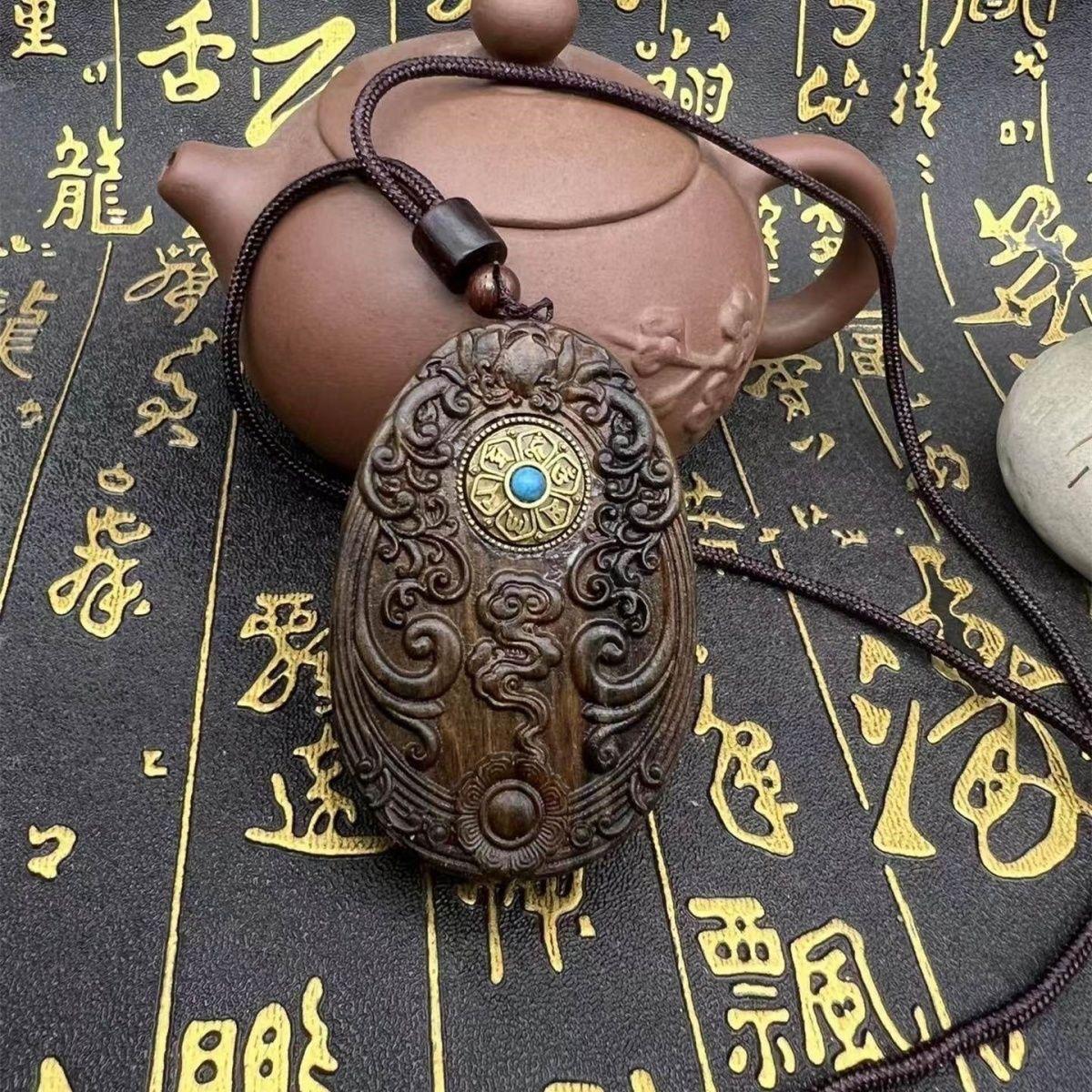 Vintage Wood Carving Sitting Buddha With a Dragon Statue Pendent from China For Sale 6