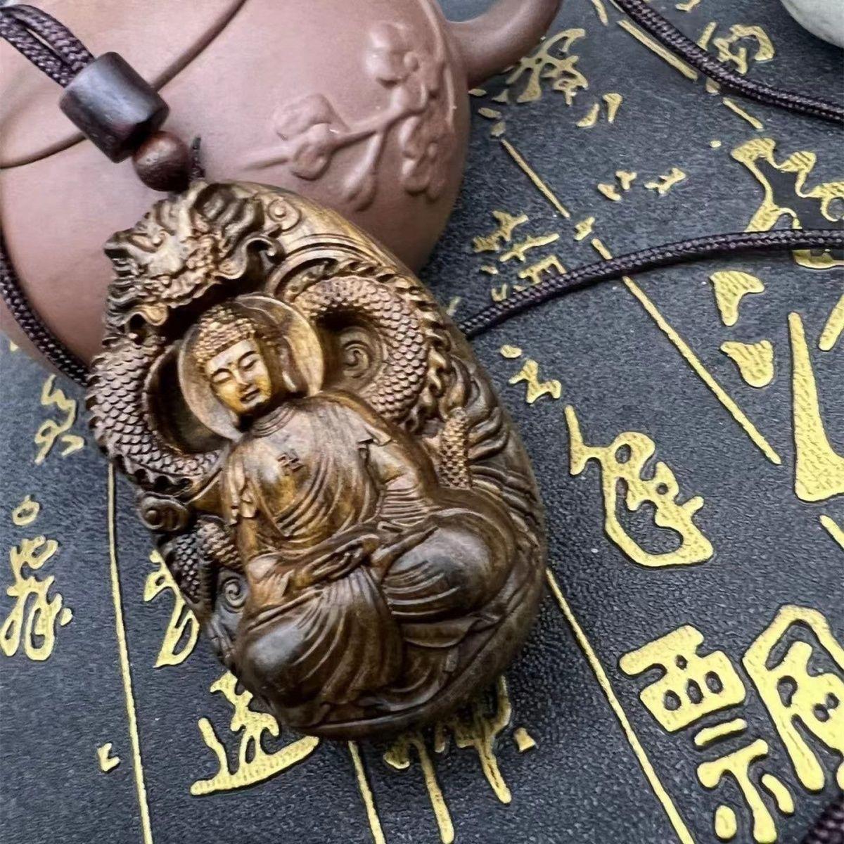 Vintage Wood Carving Sitting Buddha With a Dragon Statue Pendent from China For Sale 3