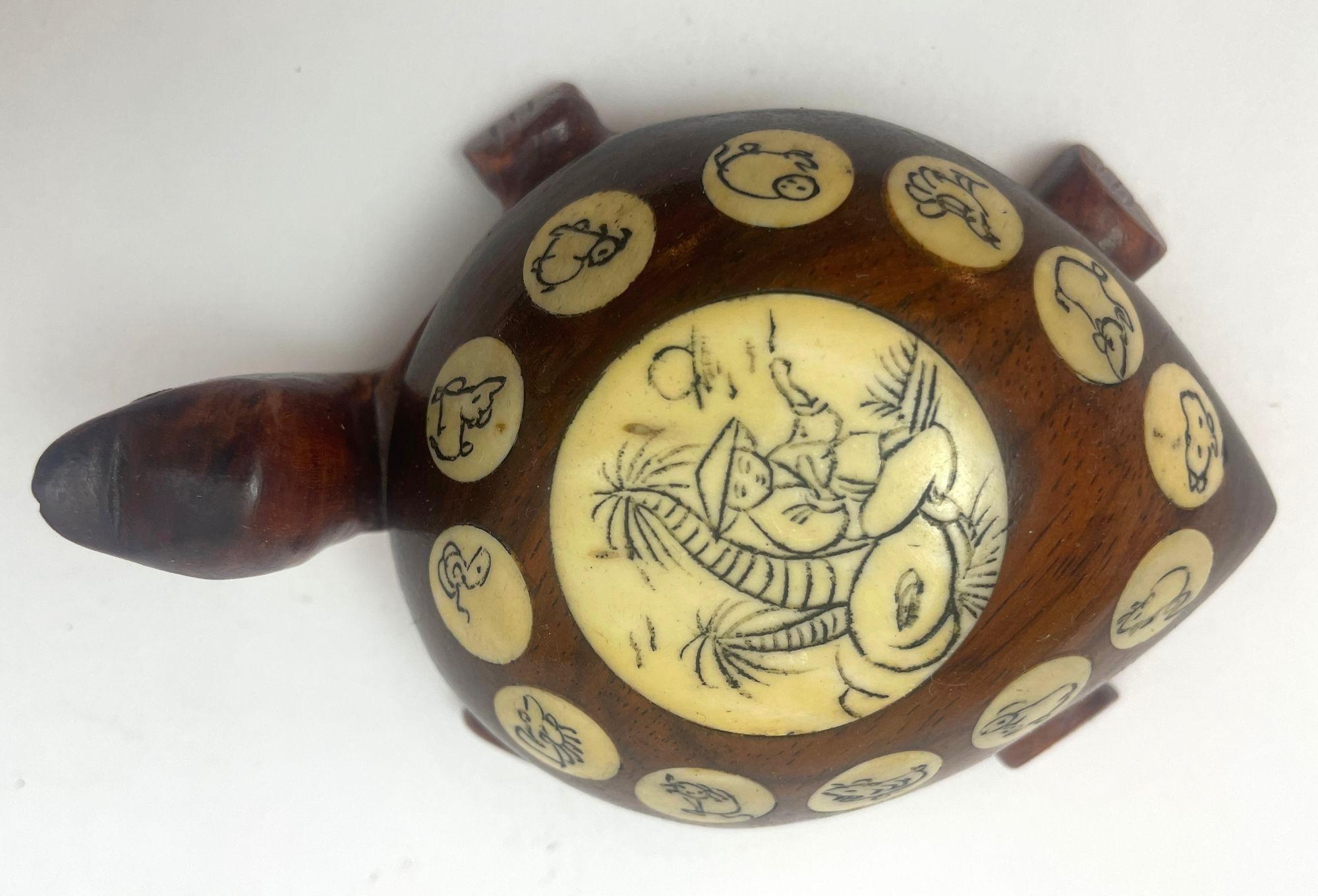 Vintage Chinese Zodiac Turtle Compass Figurine, A Unique Blend of Art and Function.
Discover the charm of traditional craftsmanship with this exquisite vintage turtle figurine from the 1970s. Handcrafted in China, this piece is not just a decorative