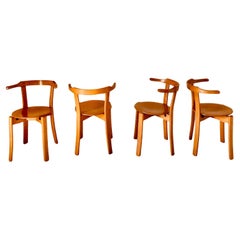 Vintage wood dining chairs in the style of Bruno Rey, set of four, Italy, 1970s