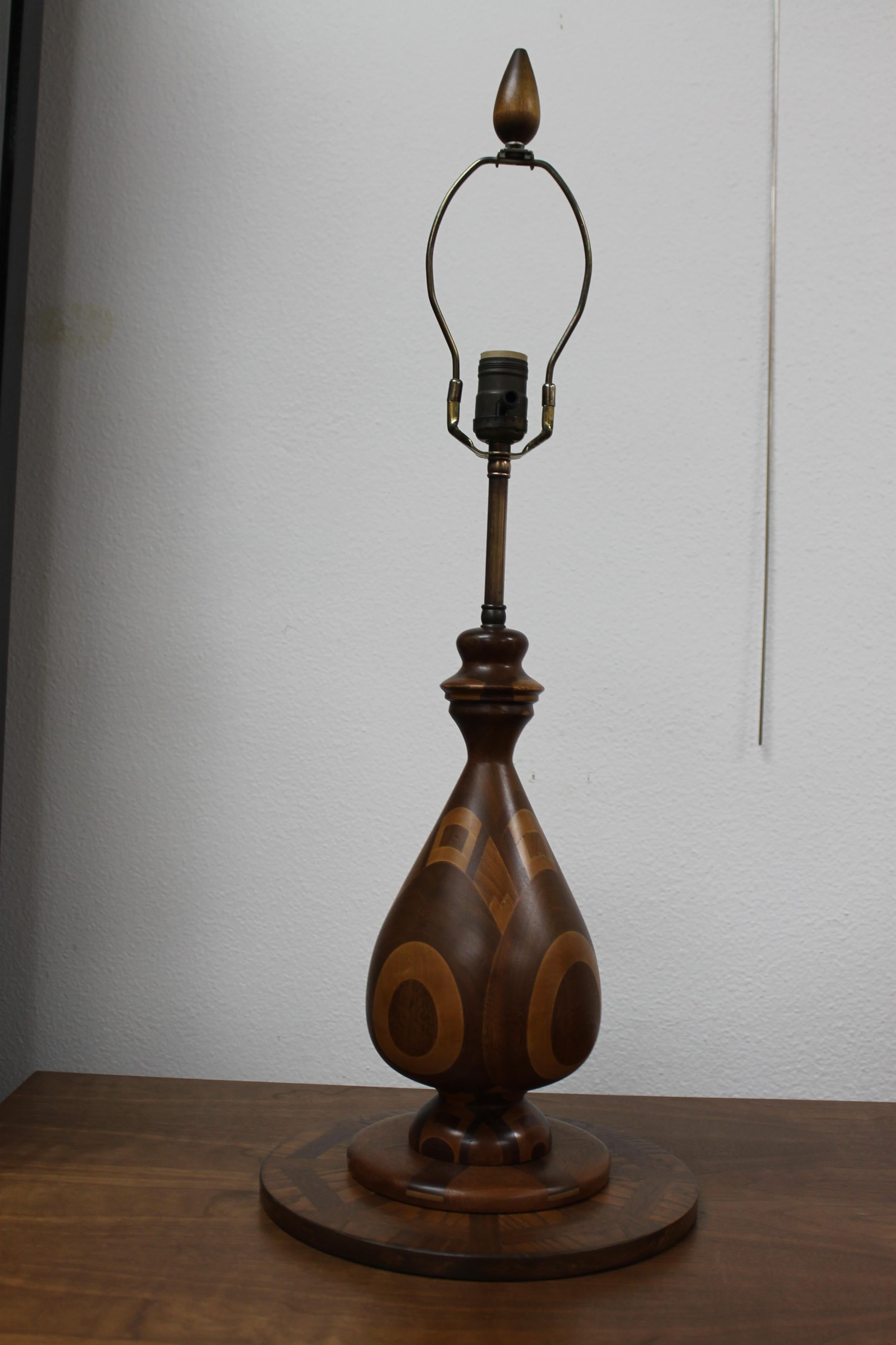 Dramatic modern form lamp with a combination of marquetry with parquetry. Measurements are 11
