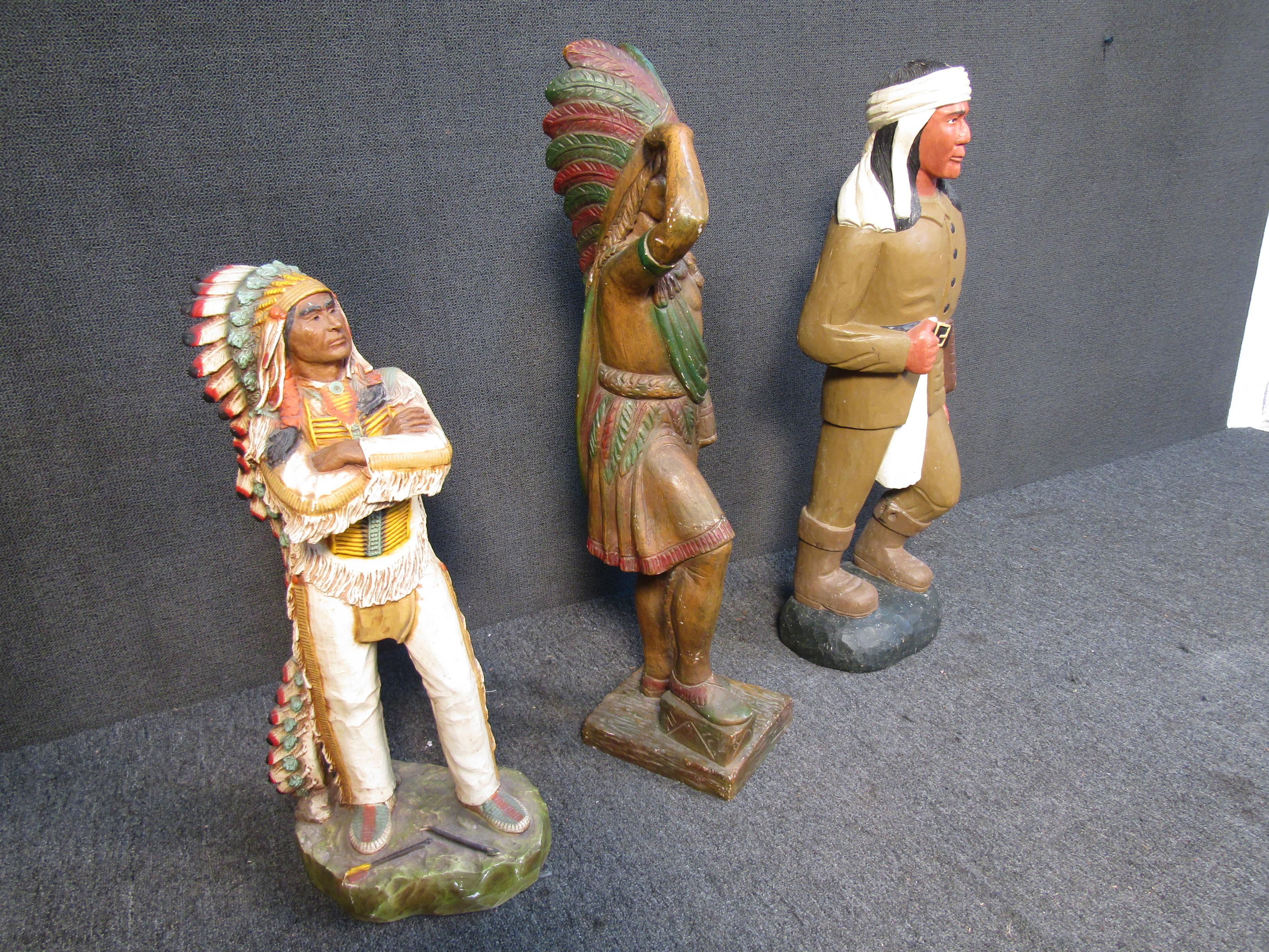 Set of three native American Statues all differing in sizes and colors. (Please confirm item location - NY or NJ - with dealer).
 