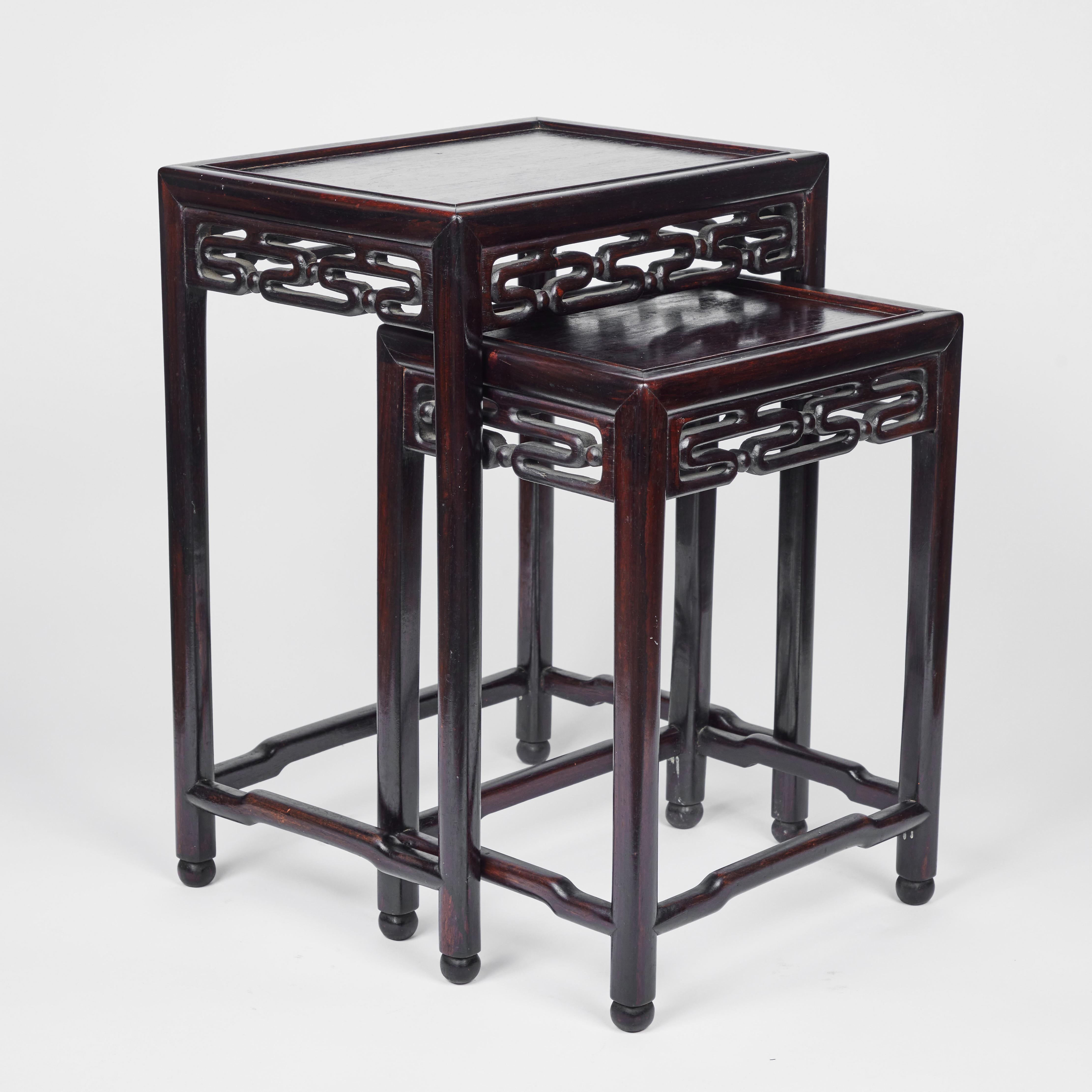 The perfect side table, this petite vintage wood 2 piece nesting table has a decorative Asian motif and maintains its elegant original dark finish.

Medium measures: 16.5
