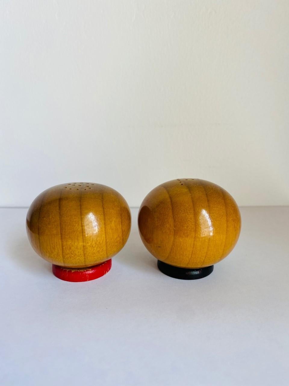 Hand-Crafted Vintage Wood Sculpted Round Salt and Pepper Shaker Set For Sale