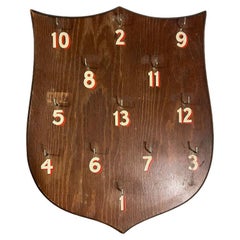 Gioco di lancio di scudi o anelli in legno vintage con ganci dopo Abercrombie