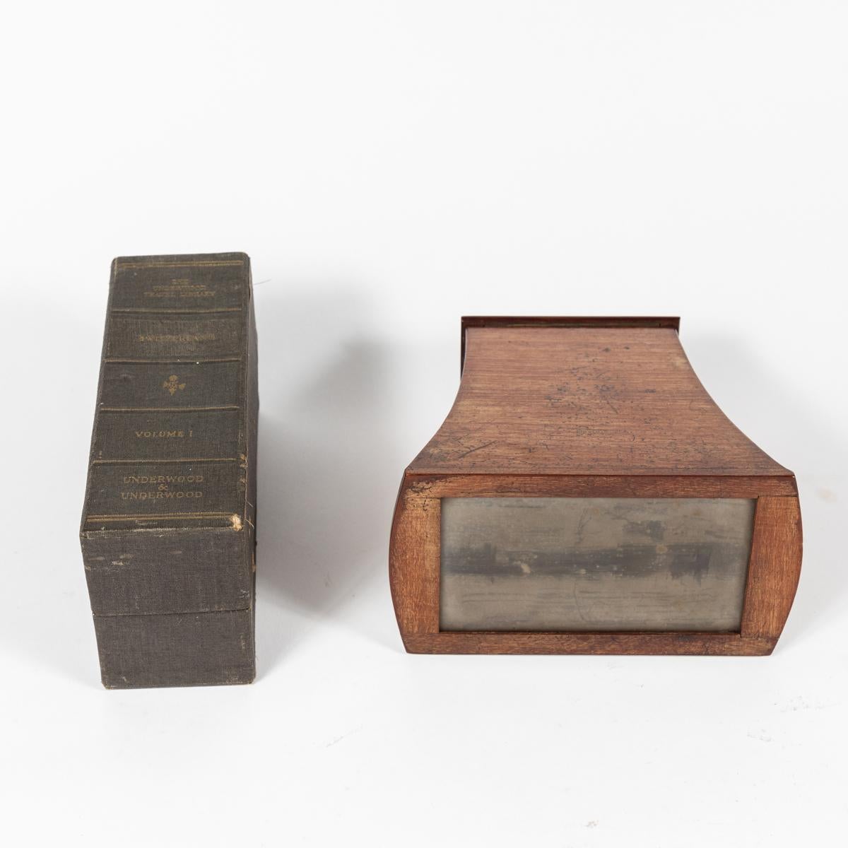 Wooden stereoscope viewer with gorgeous sepia viewing cards of the Swiss Alps from late 19th-century England. A delightful piece of visual technology, the optical effect is always a fresh surprise.

England, circa 1880

Dimensions: 7W x 7D x 4H