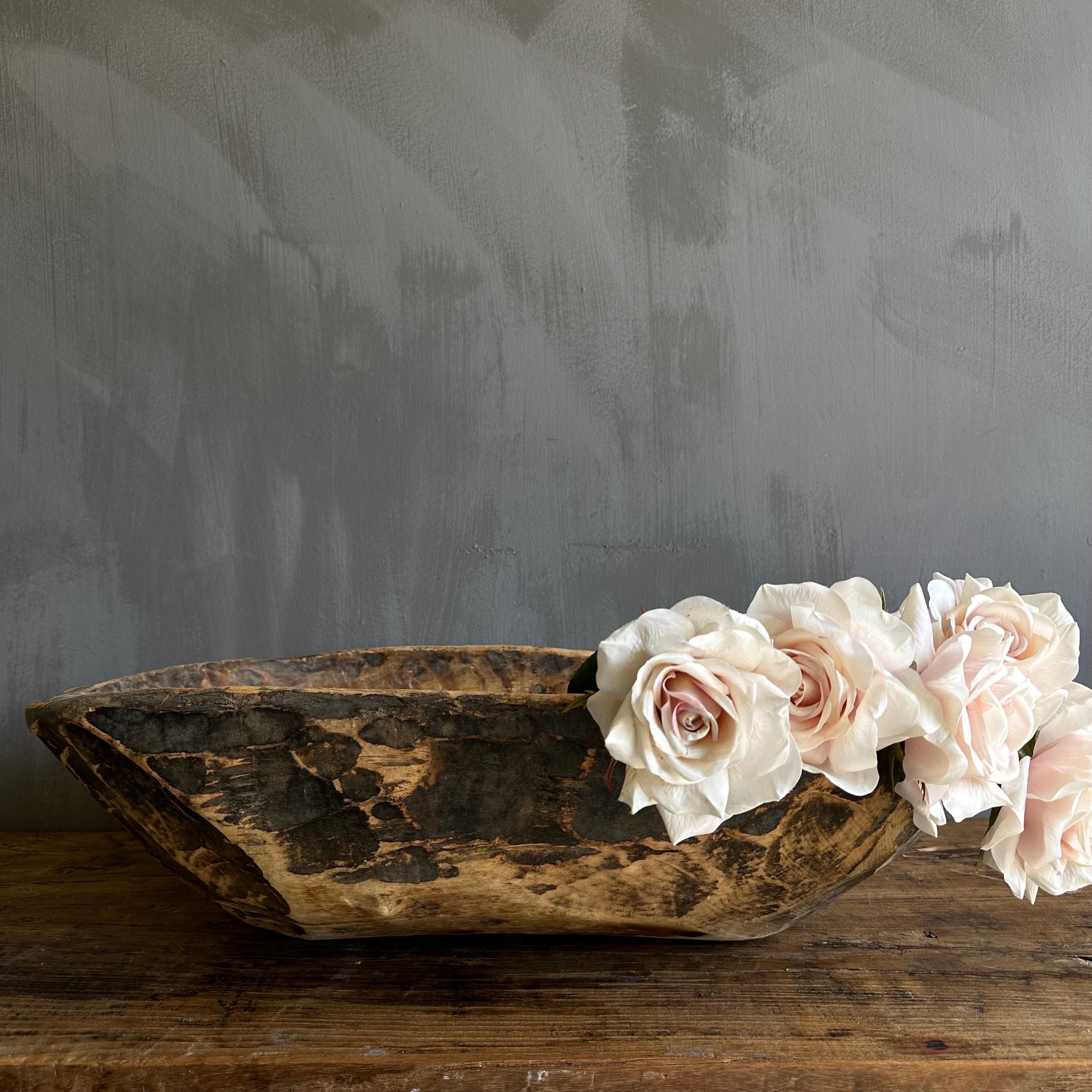 Vintage wood trough decorative bowl
Beautiful wood trough with natural patina. Can be used on a dining table or server for decoration.
Wood is natural with patina. Some troughs will have decorative metal on or around the bowl, please view the