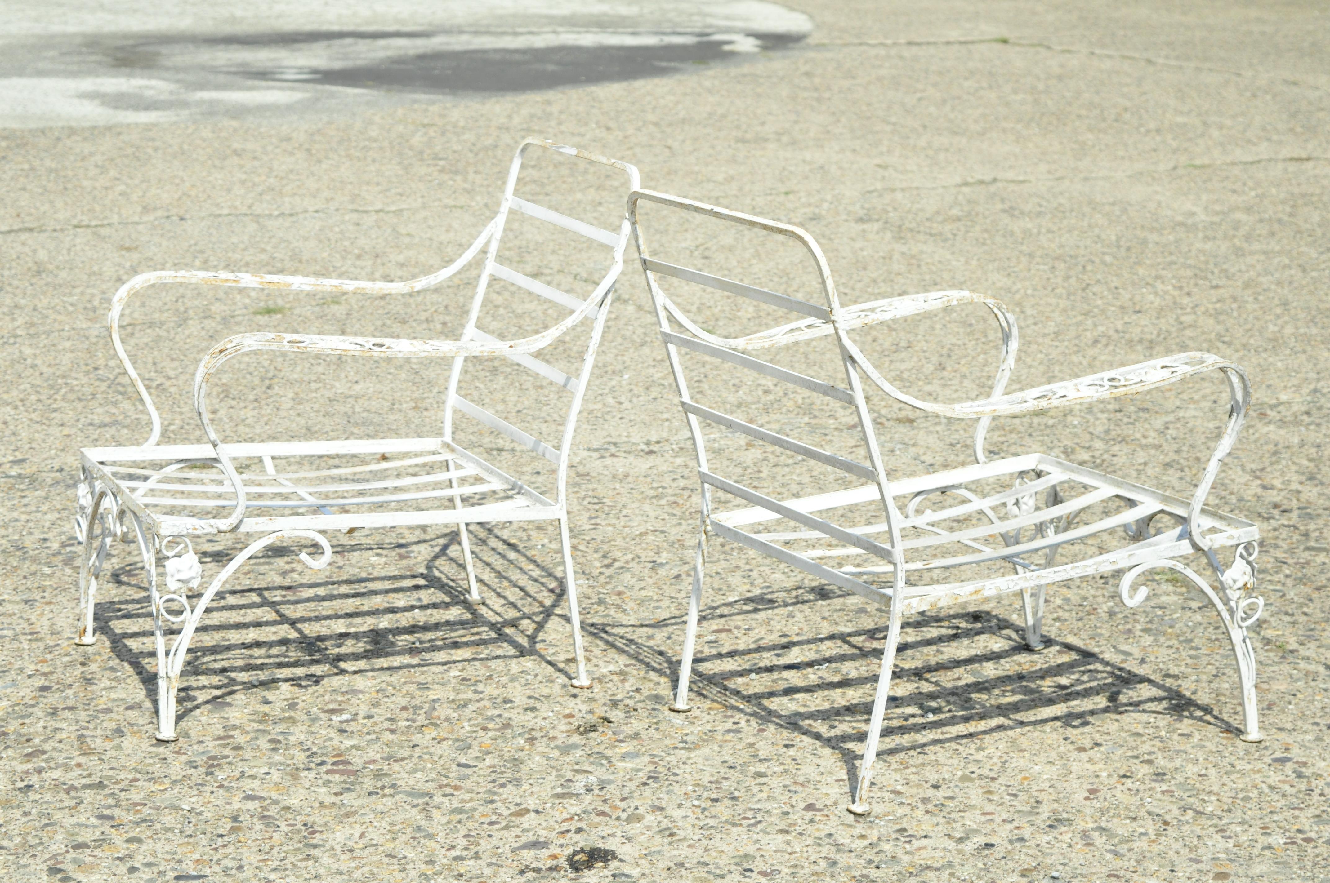 Vintage Woodard Chantilly Rose Wrought Iron Garden Patio Lounge Chairs - a Pair. Item features classic Chantilly Rose pattern, wrought iron construction, very nice vintage pair, quality American craftsmanship, great style and form. Circa Mid 20th