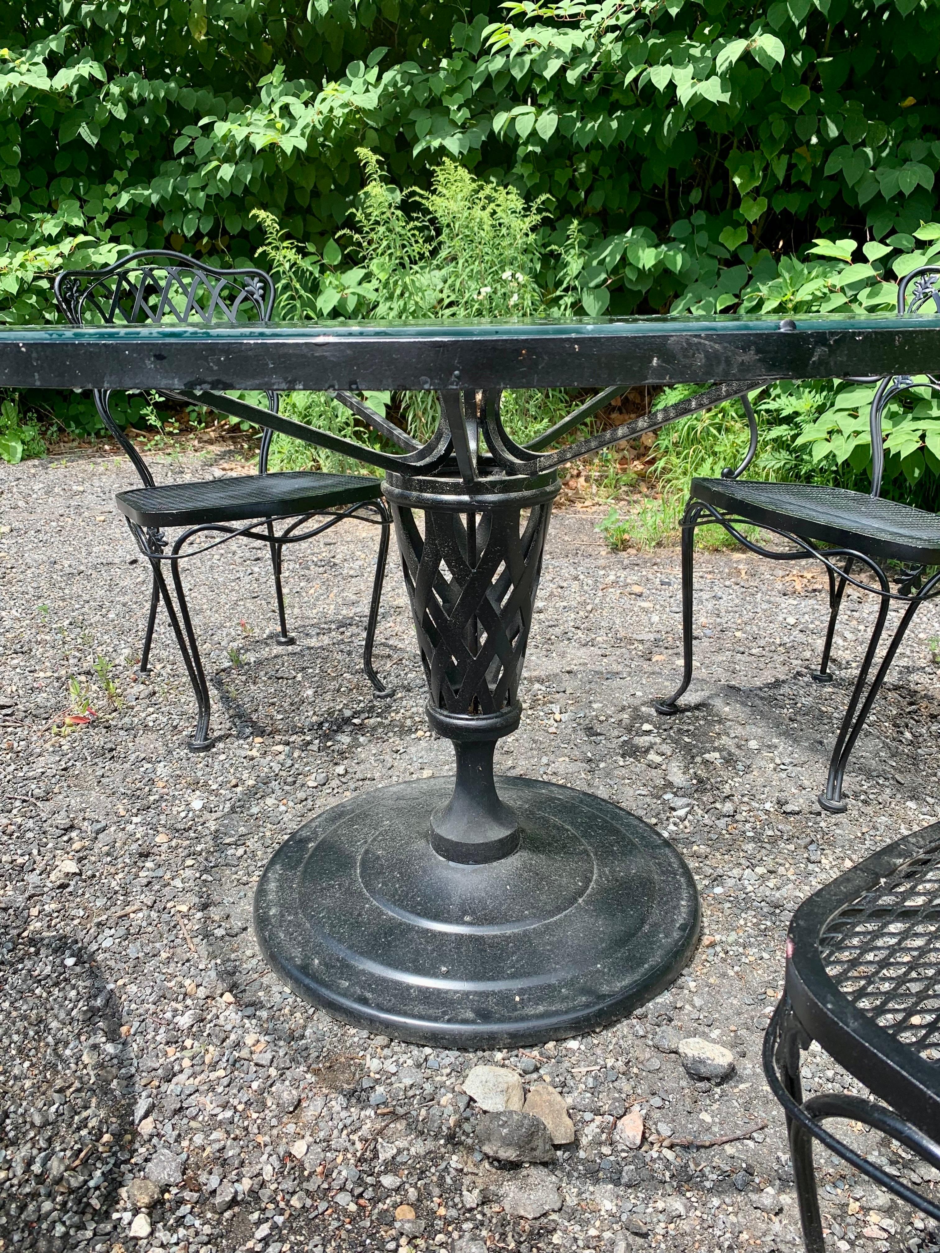 Vintage Woodard Wrought Iron Patio Dining Set 5 Piece in highly desirable and hard to find “Florentine” pattern.

Choose your own performance fabric and have our in-house upholster create new removable covers and new cushions using DryFast Marine