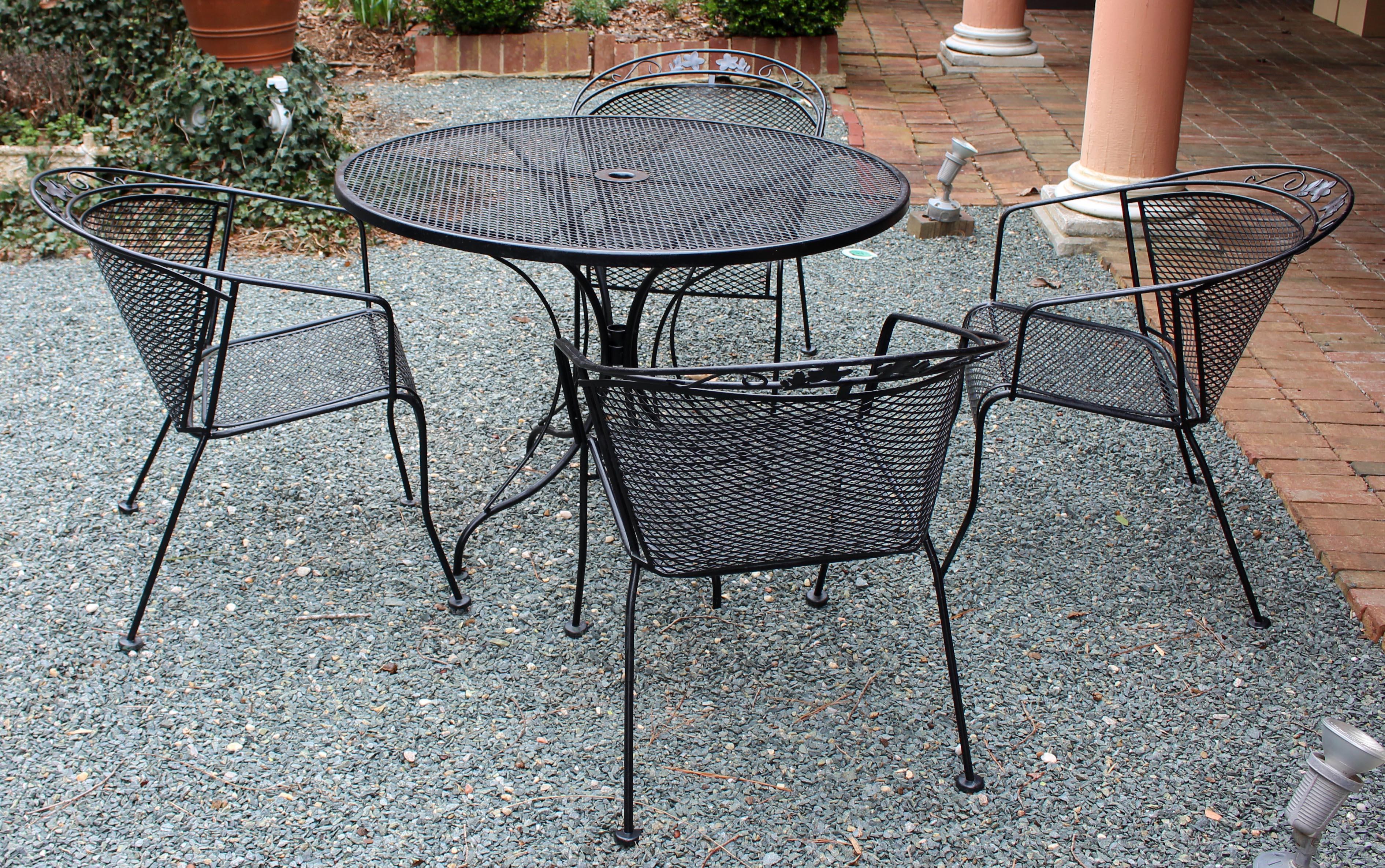 Wrought Iron Vintage Woodard Four Chair and Round Table Set