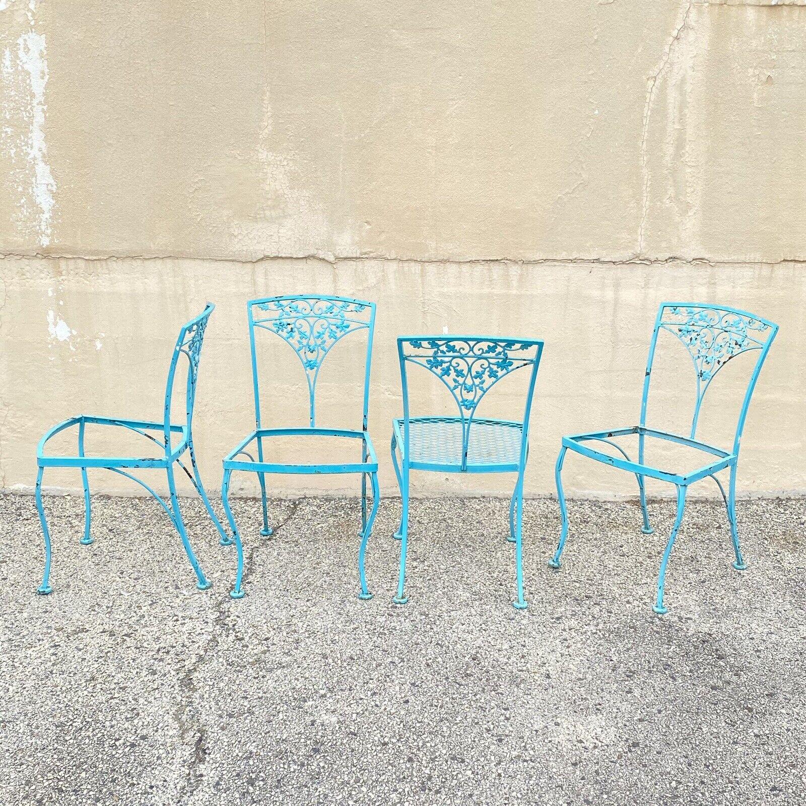 Vintage Woodard Orleans Pattern Wrought Iron Garden Patio Dining Chairs - Set of 4. Circa Mid 20th Century. Measurements: 33.5