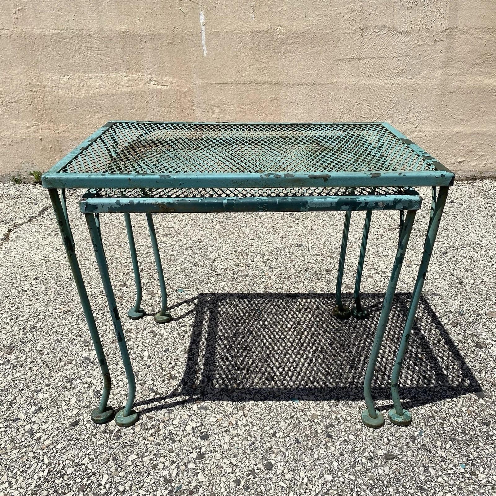 Vintage Woodard Wrought Iron Green Painted Garden Patio Nesting Side Tables - 2 Pc Set. Circa Late 20th Century. Measurements:  Larger table: 19
