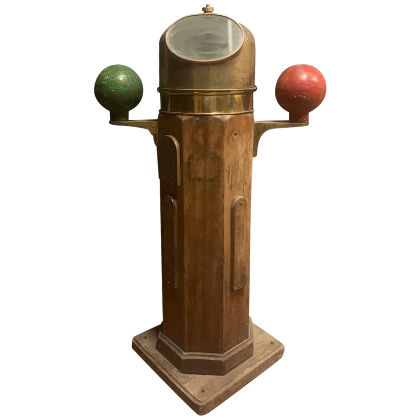 Vintage wooden and brass ship's compass with side weights, Italy