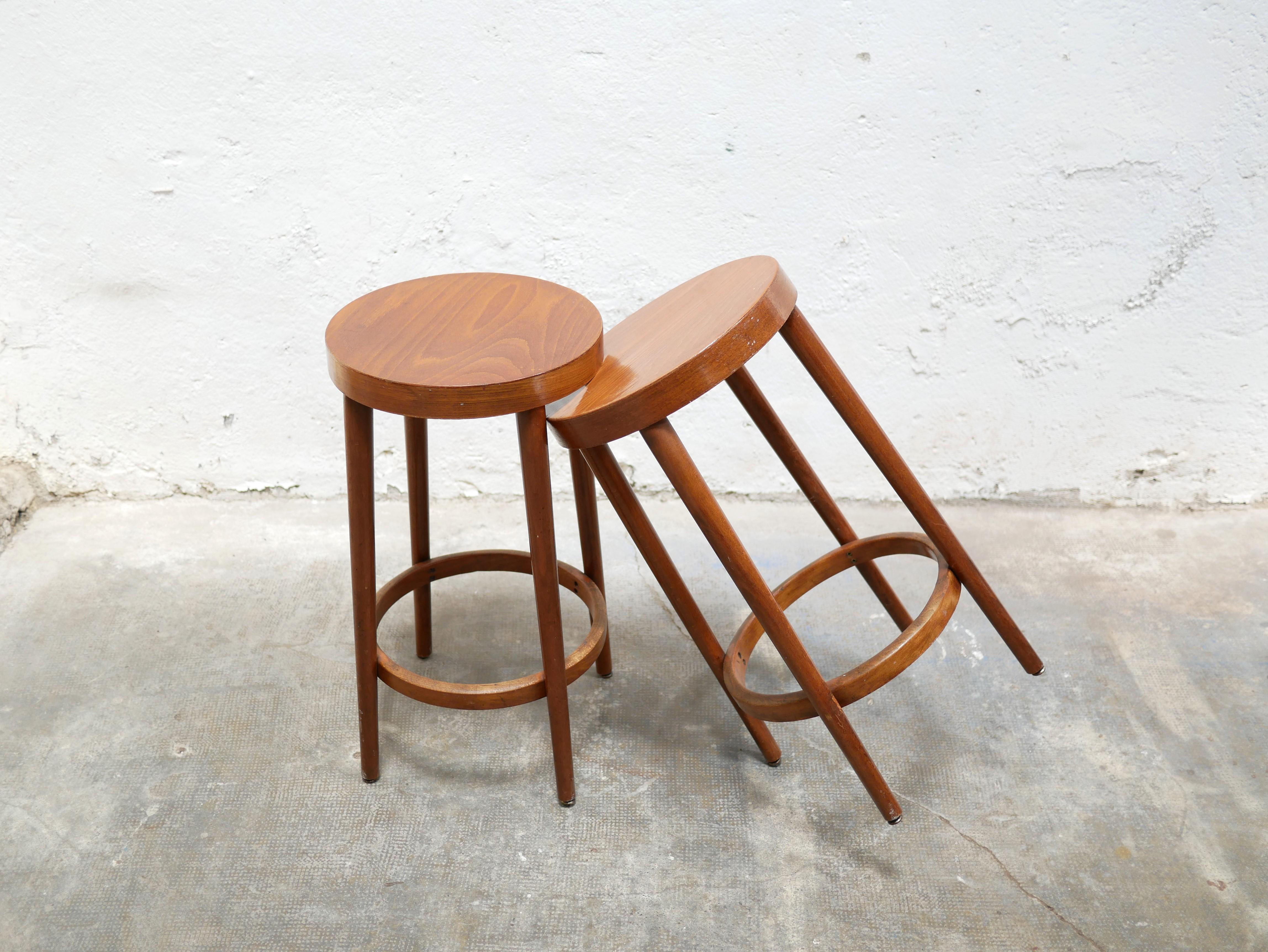 Bar stool manufactured by Baumann editions, France in the 80s. 

It will be perfect around a kitchen island or around a high table by mixing it with other mismatched stools or bar chairs or as an occasional stool in a world where styles are
