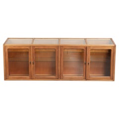 Vintage wooden counter / display cabinet / museum cabinet with warm colours