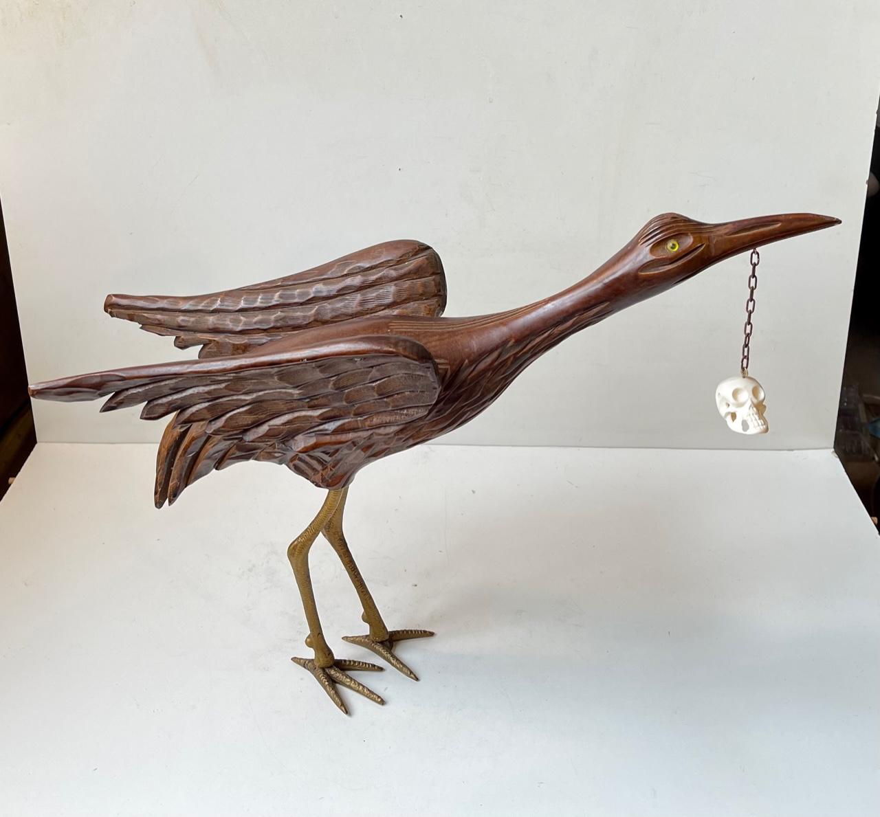 Modern Vintage Wooden Crane Bird Sculpture with Suspended Skull For Sale