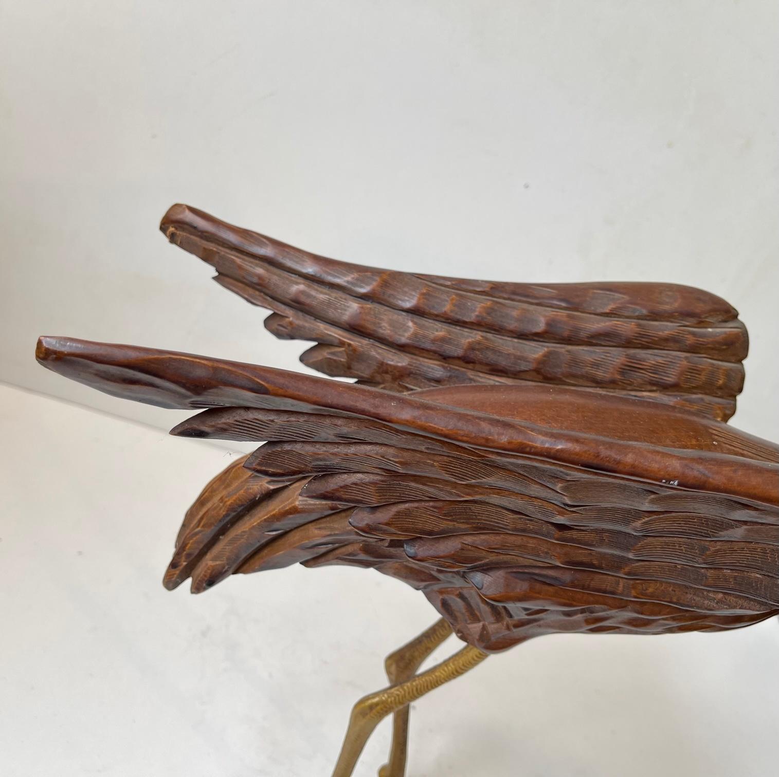 European Vintage Wooden Crane Bird Sculpture with Suspended Skull For Sale