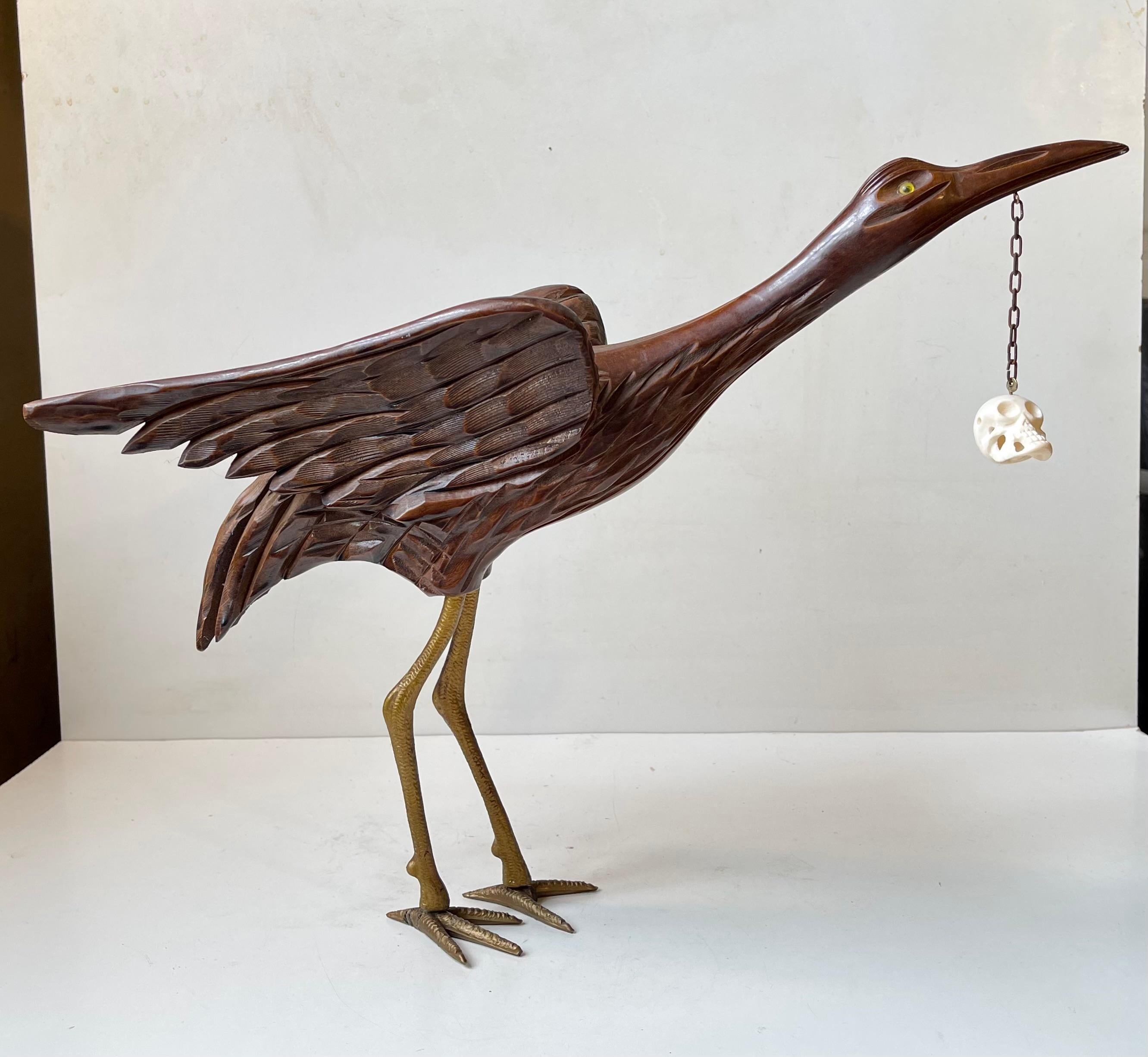 20th Century Vintage Wooden Crane Bird Sculpture with Suspended Skull For Sale