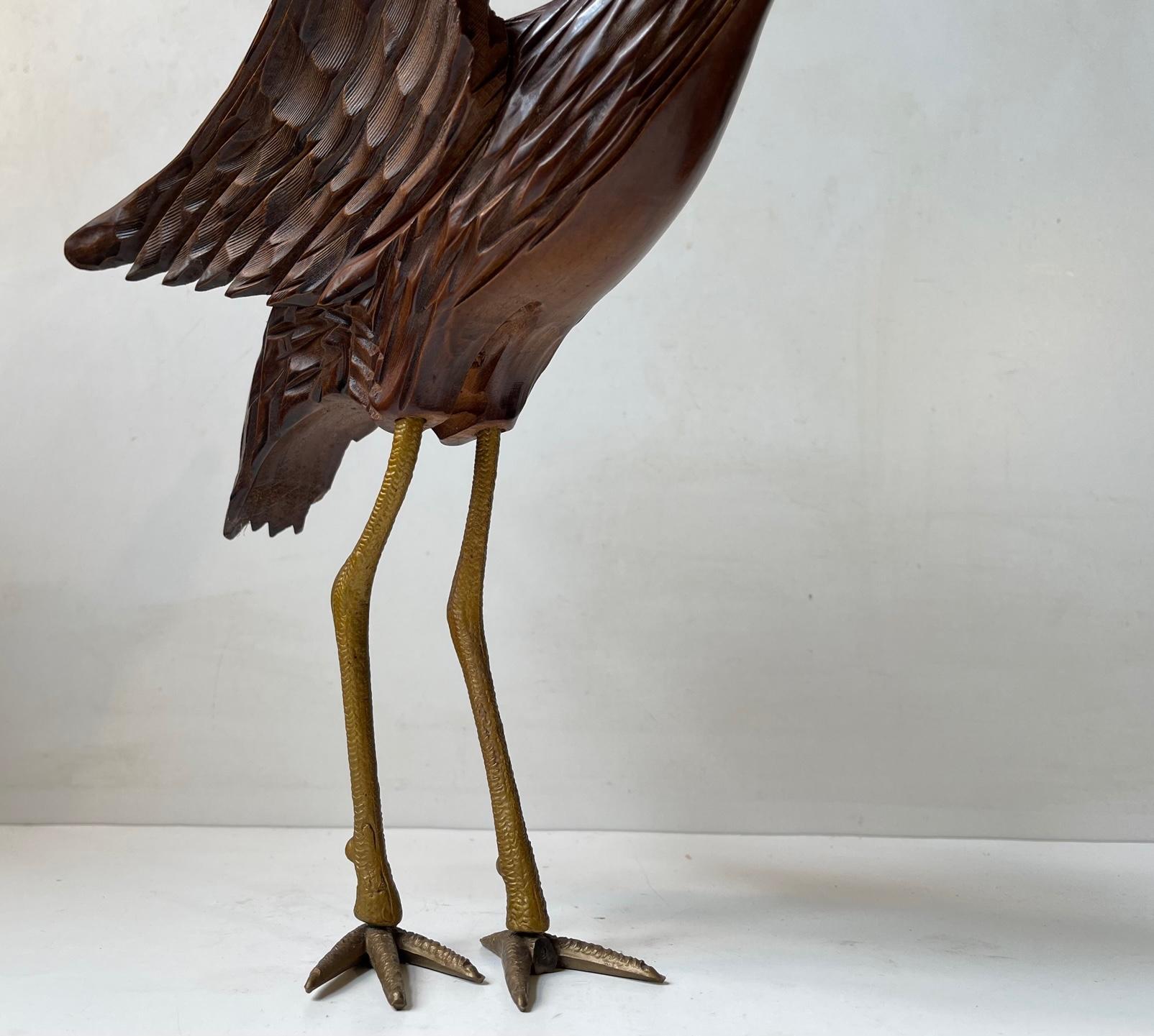 Bakelite Vintage Wooden Crane Bird Sculpture with Suspended Skull For Sale