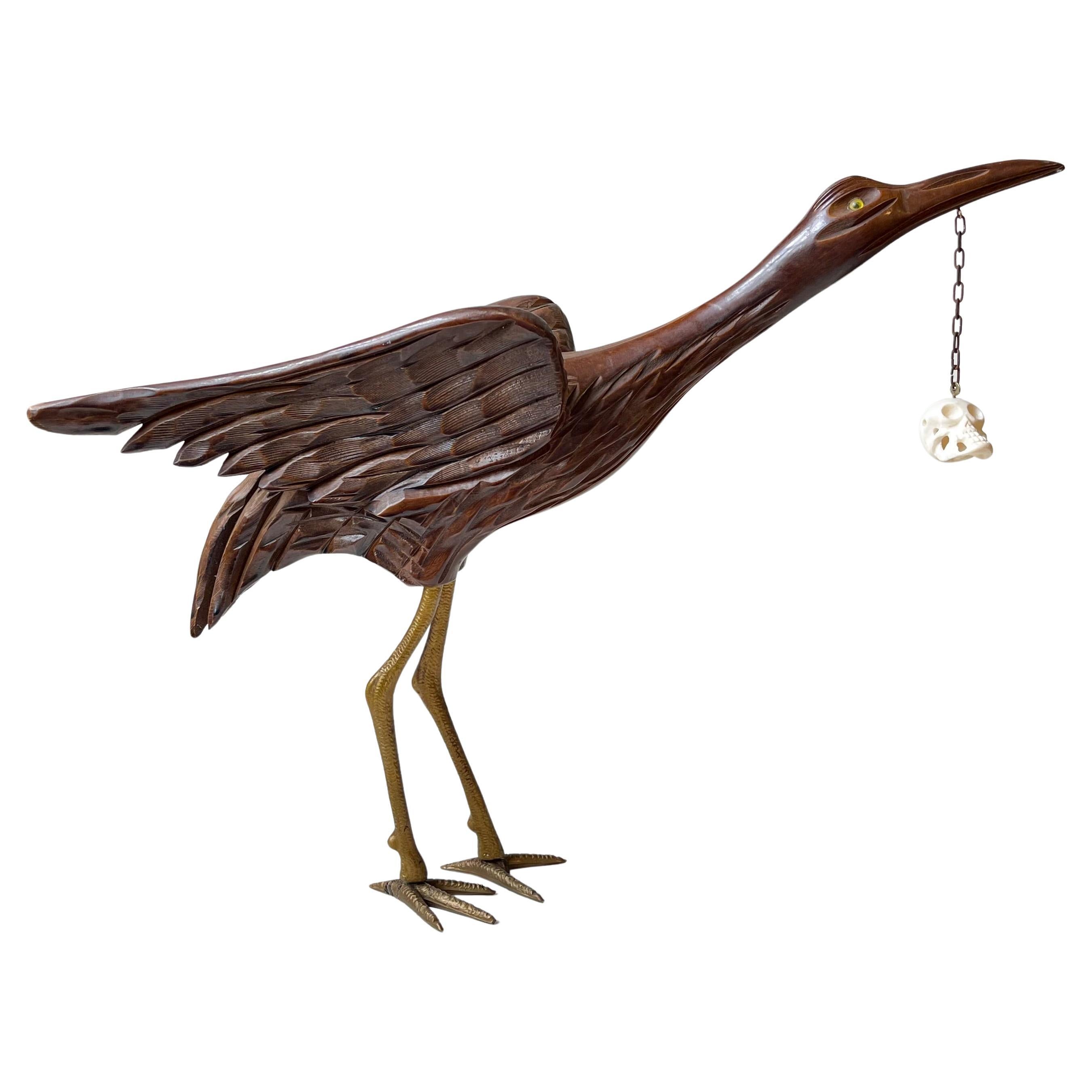 Vintage Wooden Crane Bird Sculpture with Suspended Skull For Sale