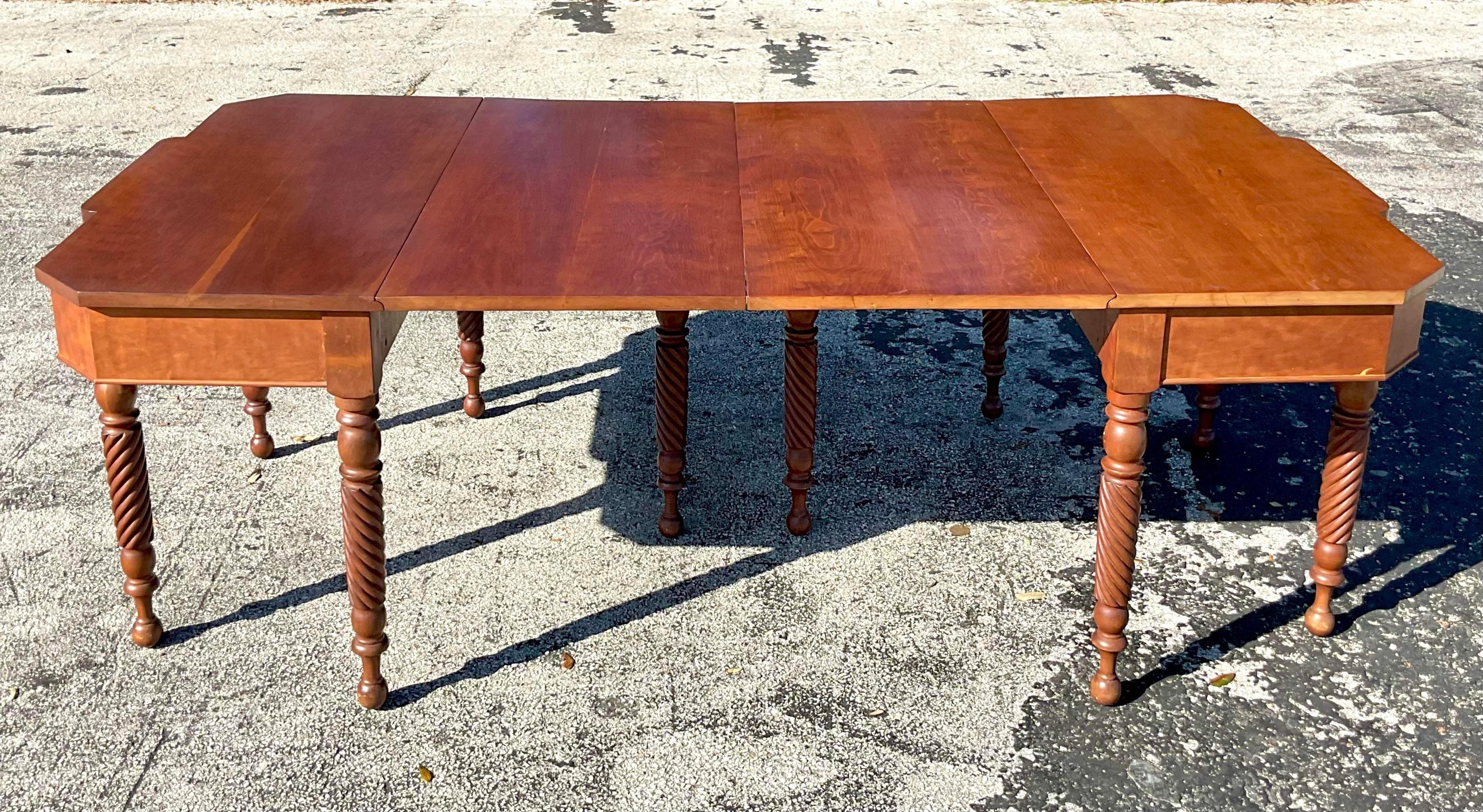A fabulous pair of vintage Boho console tables. Made by the Botts group and tagged inside the drawer. Gorgeous hand carved detail with a drop leaf design. These console tables have the added benefit that they can be connected to create a full size