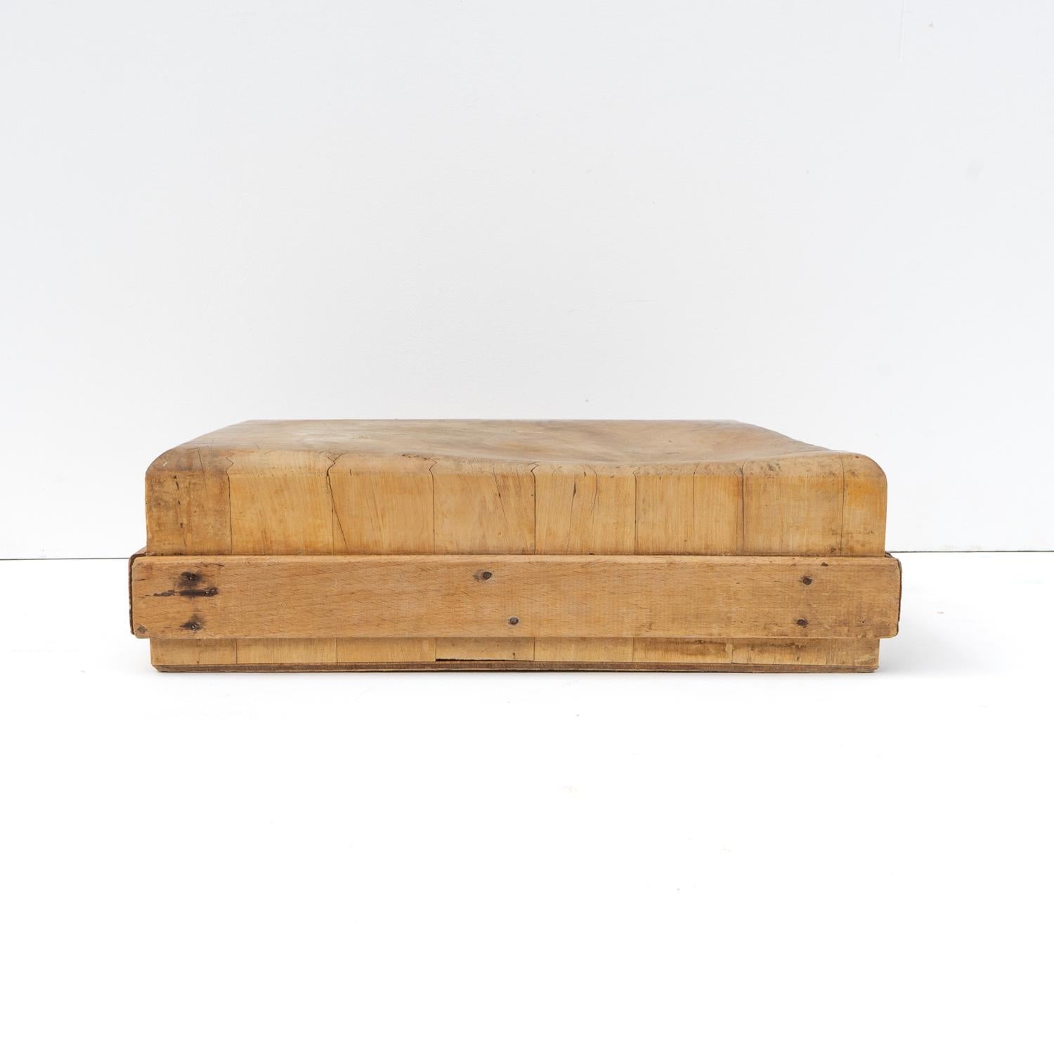 COUNTER TOP BUTCHERS BLOCK

Pieces of end grain wood block bought together in a square chunky form

Slightly undulating surface naturally worn down over time from use.

It is in good vintage condition with wear consistent with age and