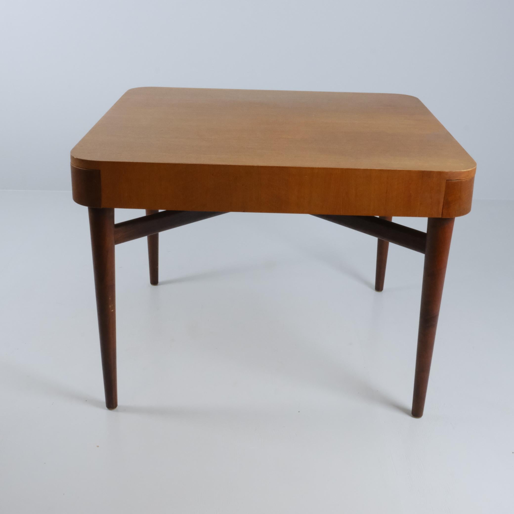 A refined and possibly unique game or card table attributed to the Finnish interior architect and designer Carin Bryggman. This exceptional piece originates from a private residence that featured custom furnishings commissioned from Bryggman. The