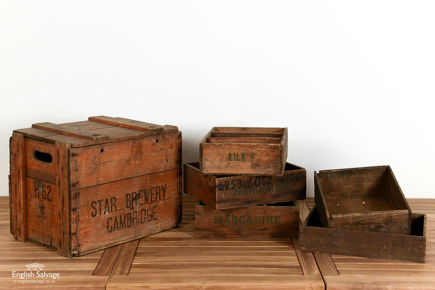 Selection of reclaimed wooden crates. Three margarine / lily crates are each roughly 34.5 cm wide x 10.5 cm high x 28 cm deep and have two dividers, one single crate is 37.5 cm wide x 8 cm high x 28 cm deep and the smallest single crate is 29.2 cm