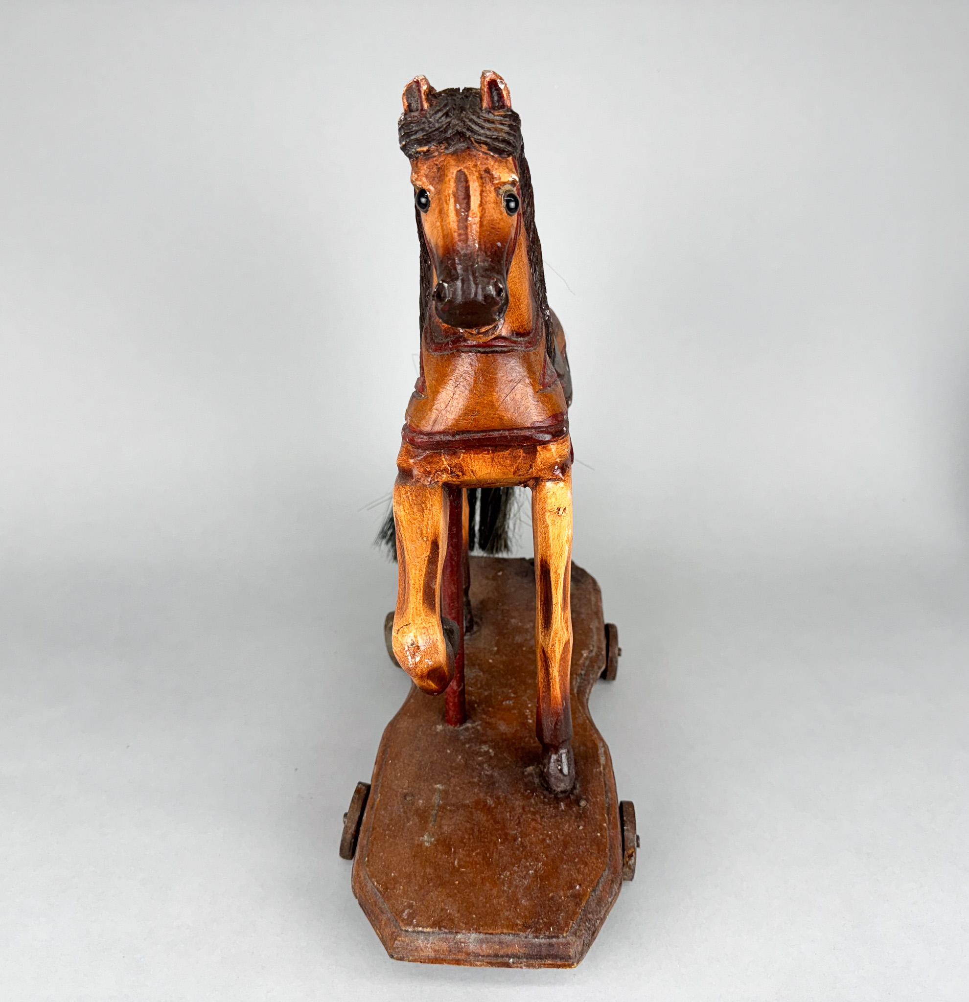 Metal Vintage Wooden Horse on Wheels For Sale