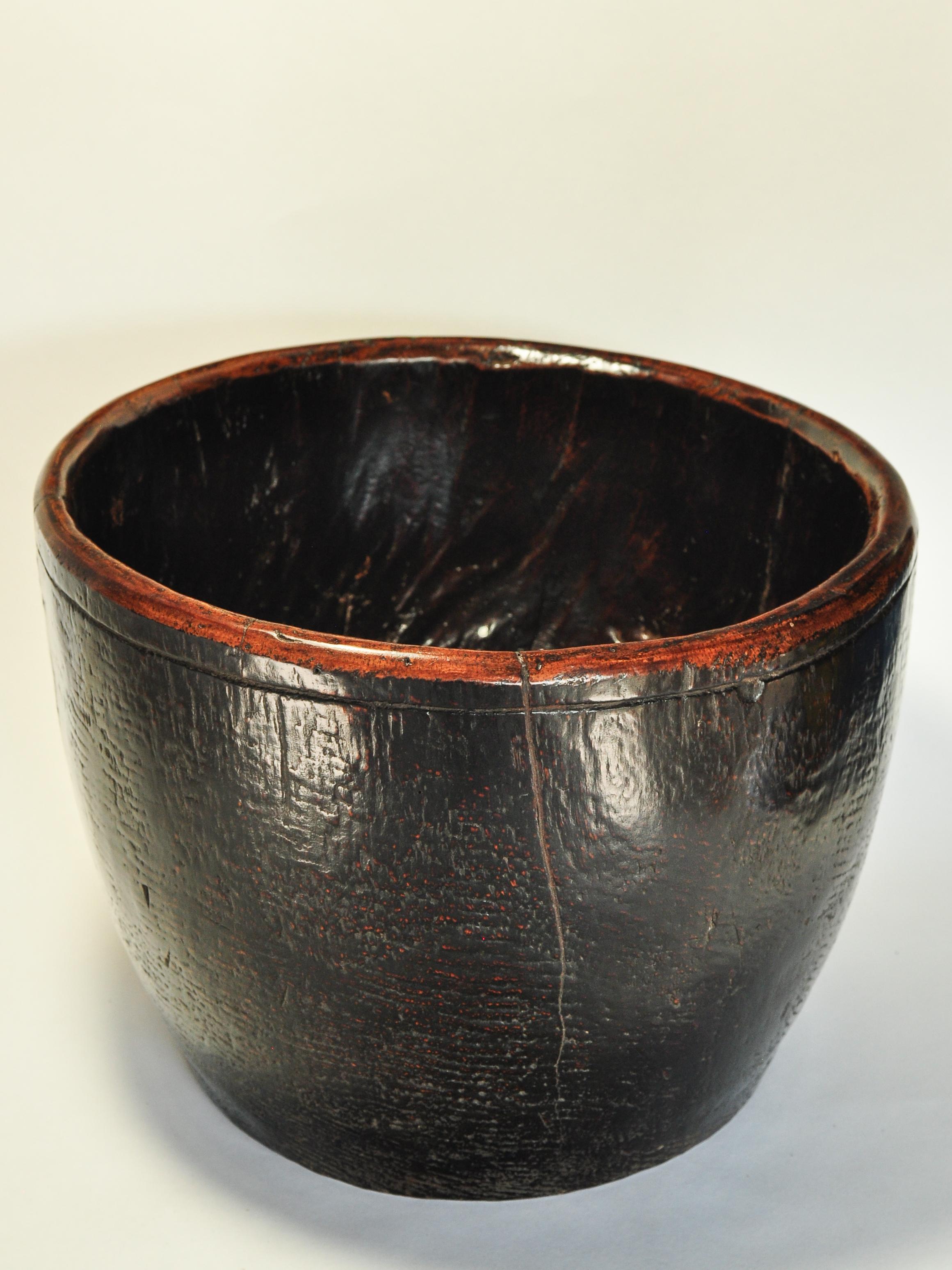 Vintage Wooden Measure from Lampung, Sumatra, Mid-20th Century. 
This handcrafted wooden measuring pot comes from Lampung province in southern Sumatra. It is crafted by hand from a single piece of merbau wood, highly prized for its density and
