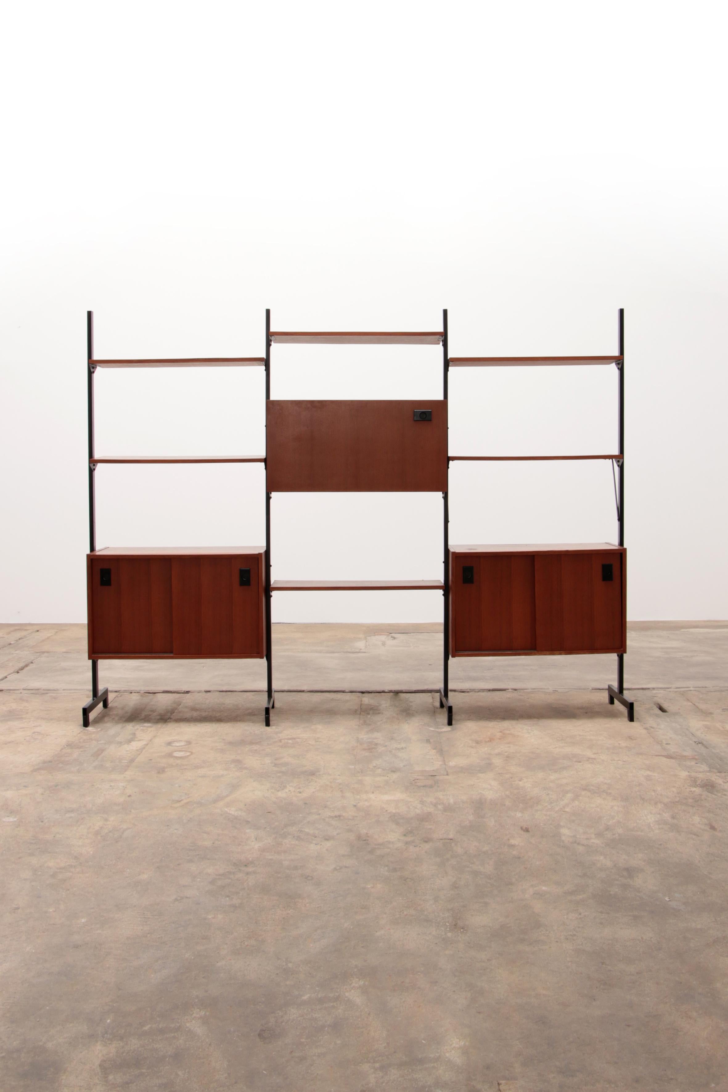Large modular storage unit and bookcase or wall unit. Structure in black lacquered iron and teak veneer elements. Made in Italy, 1960s. A modernist piece of furniture with a pure design, ideal for storing what you don't want to see or show and to