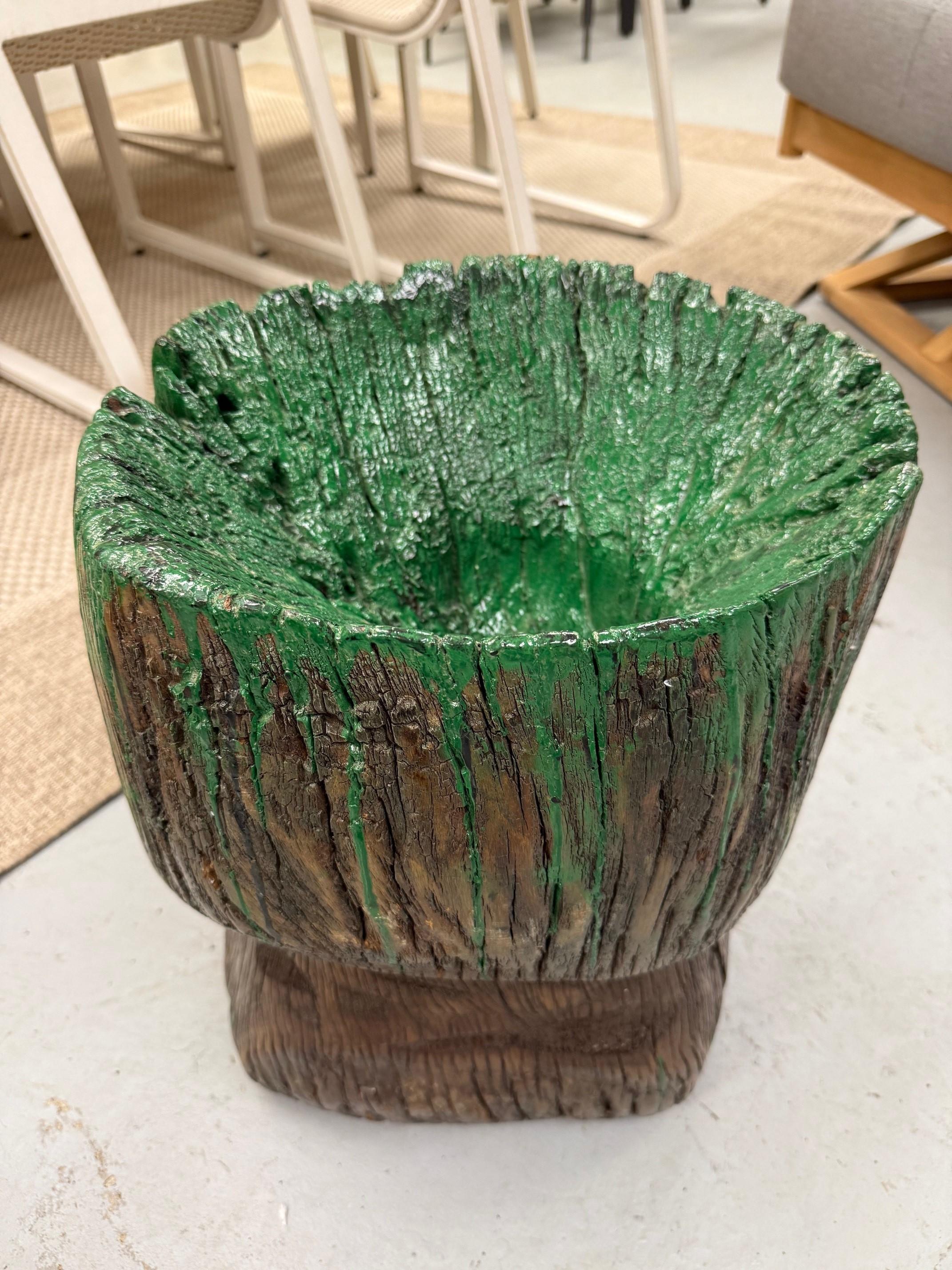 Vintage wooden mortar or planter from a tree or root base. Not sure exactly what this is, maybe a old mortar or just a decorative piece of wood. It could be used as a small table if you add a glass top or just a decorative piece. I do know it was