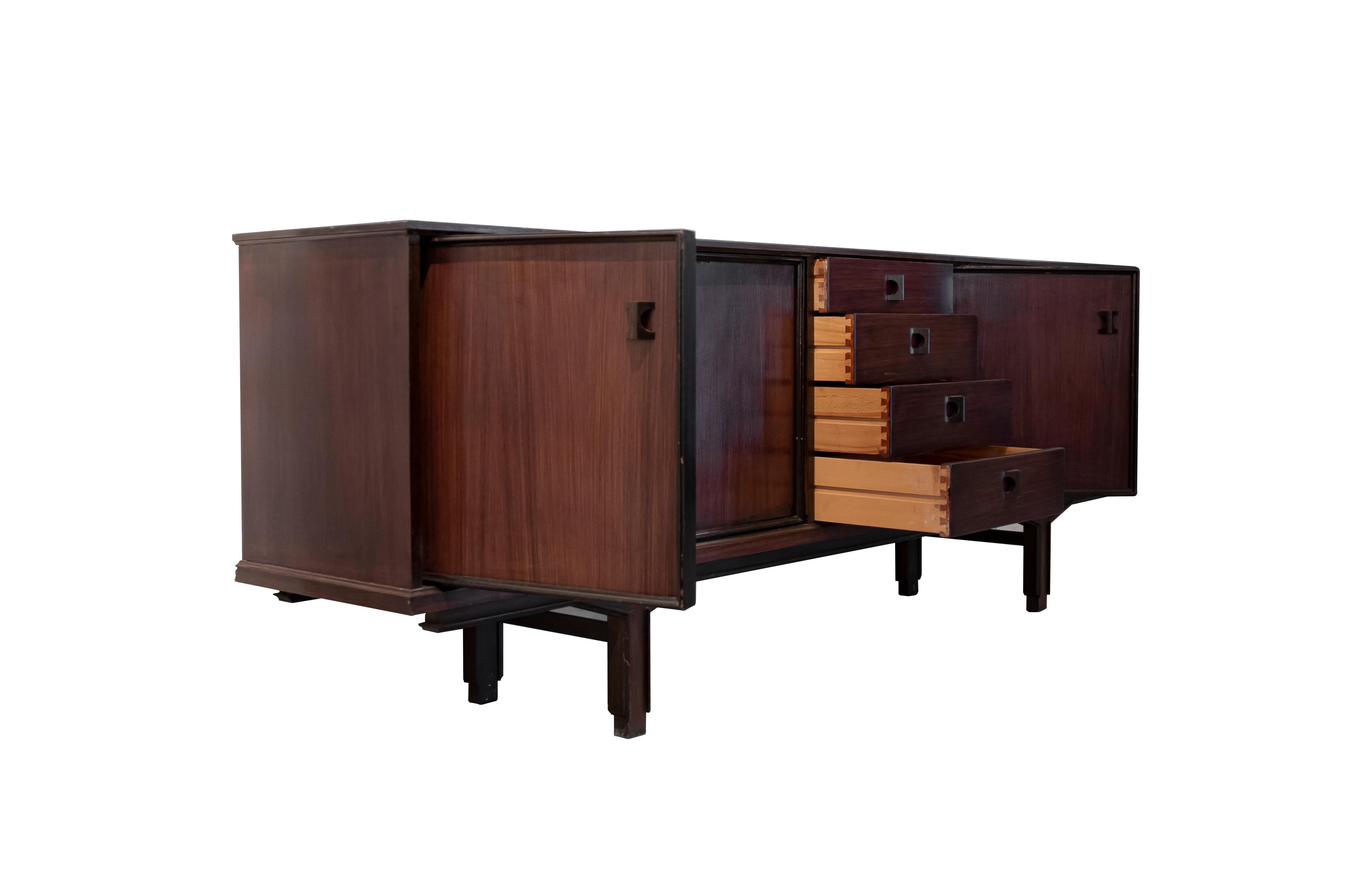 Vintage wooden sideboard is an original design furniture realized in the 1960s. 

Made in Italy. 

Wood. Total dimensions: 80 x 45 x 245 cm.

Mint conditions. 

 