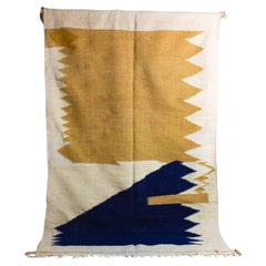 Tapis berbère vintage aux formes abstraites en bleu et beige