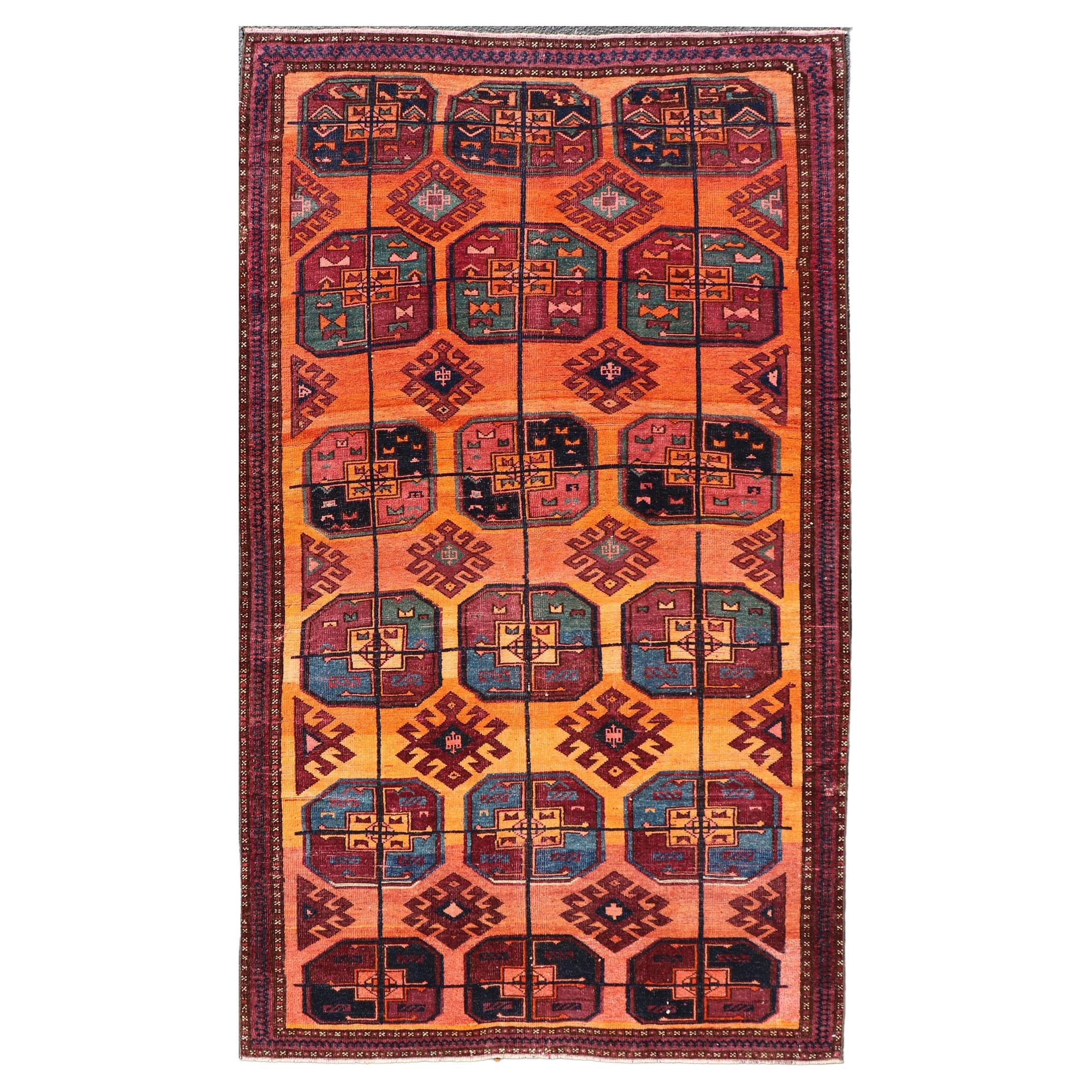 Vintage Wool Ersari Rug in Wool with Gul Design in Orange, Blue, and Brown For Sale