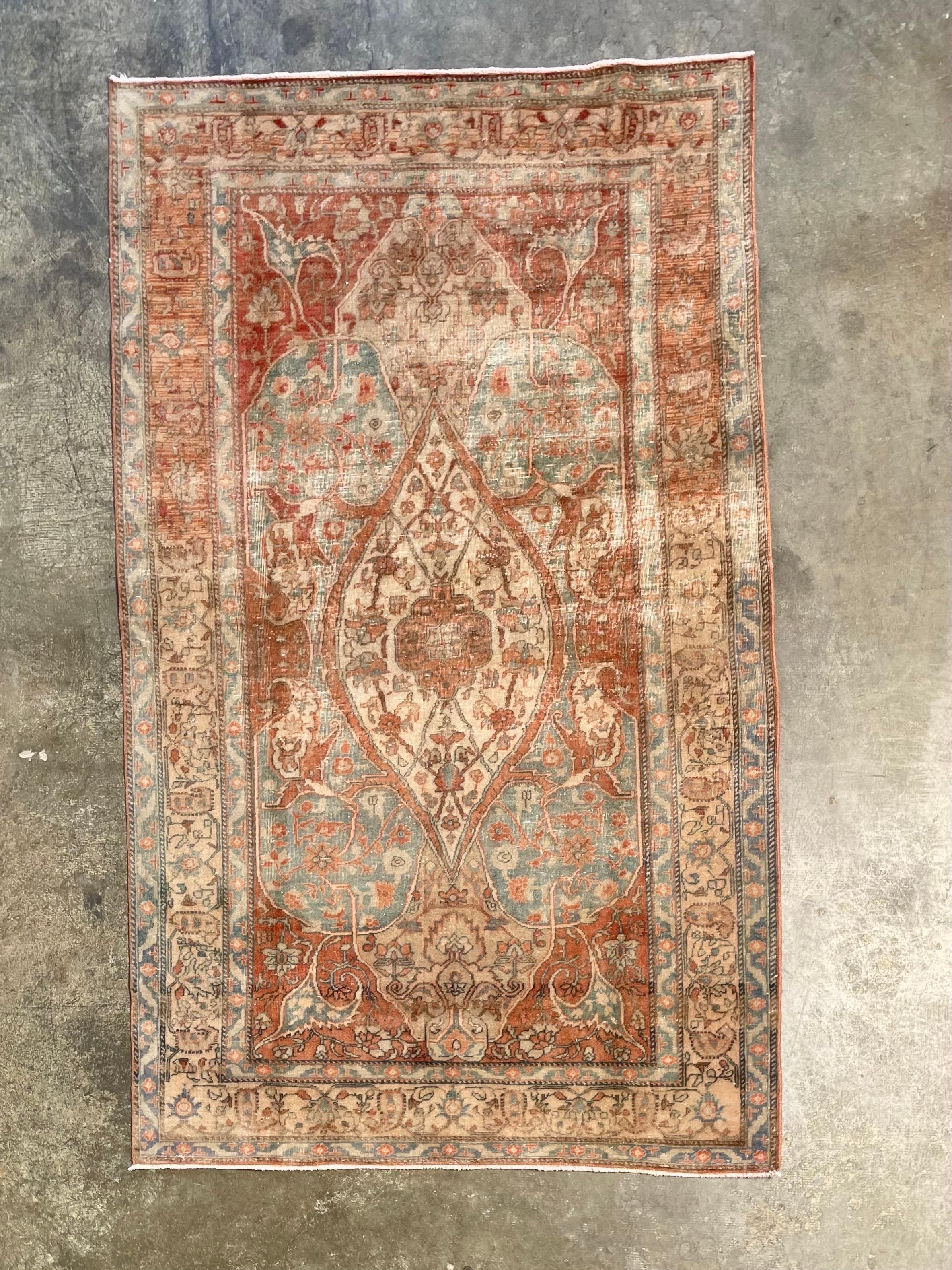 Vintage Turkish rug
This Turkish rug is an heirloom-quality antique area rug with timeless tones and an intricate pattern sure to add history, beauty and character to any space it adorns. As with all vintage item this piece may have imperfections,