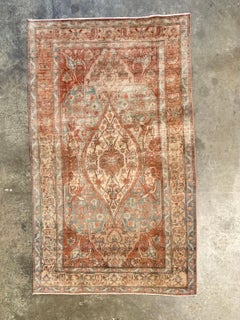 Tappeto turco in lana vintage nei toni del blu e del ruggine