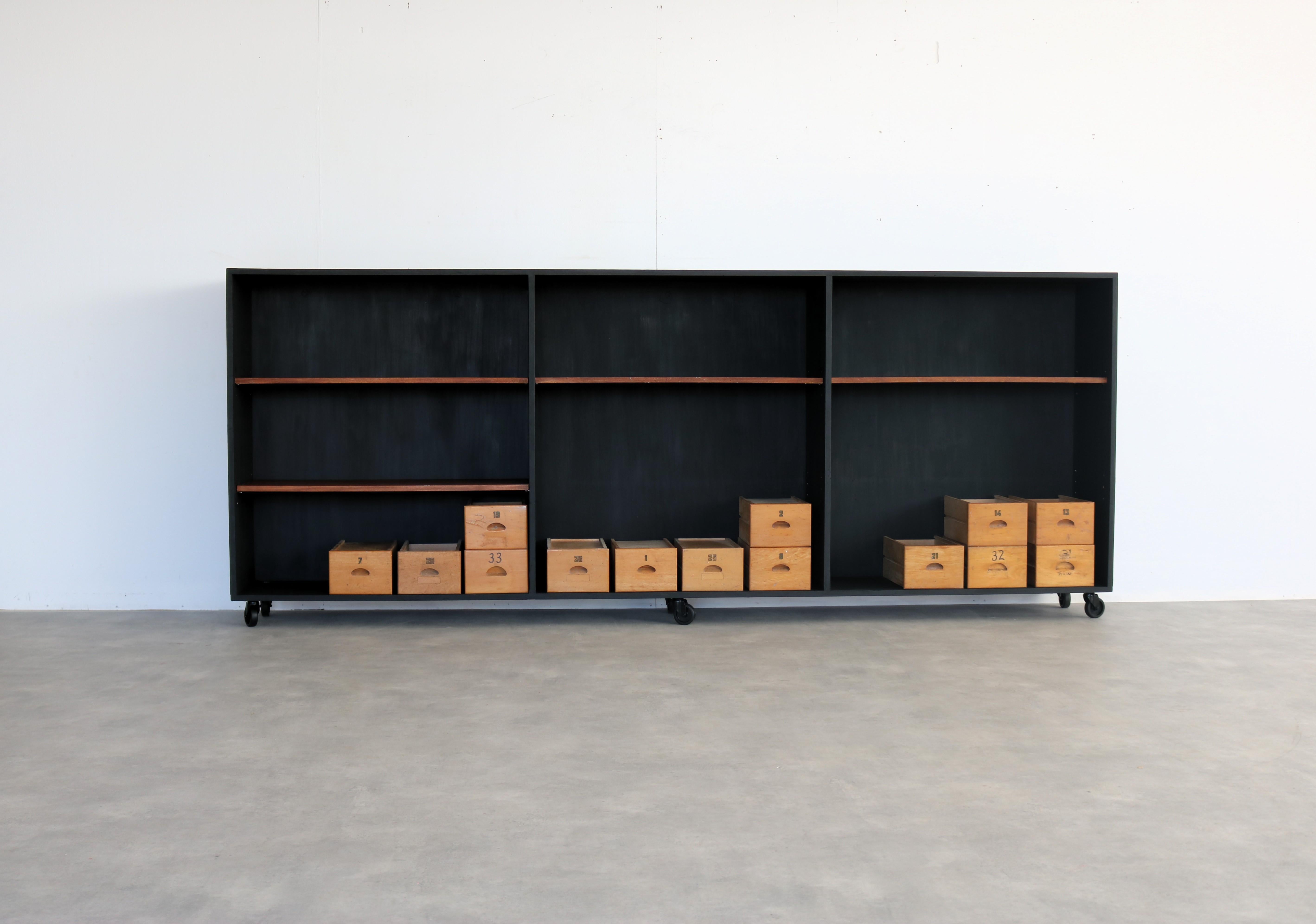 Vintage workbench  sideboard  school cupboard  1960s

Period  1960s
Design  Unknown
Condition  Good  Patina/Signs of Use
Size  120 x 300 x 40 cm (H x W x D)

Details  Wood; Includes 14 storage bins;

Item number  2873
