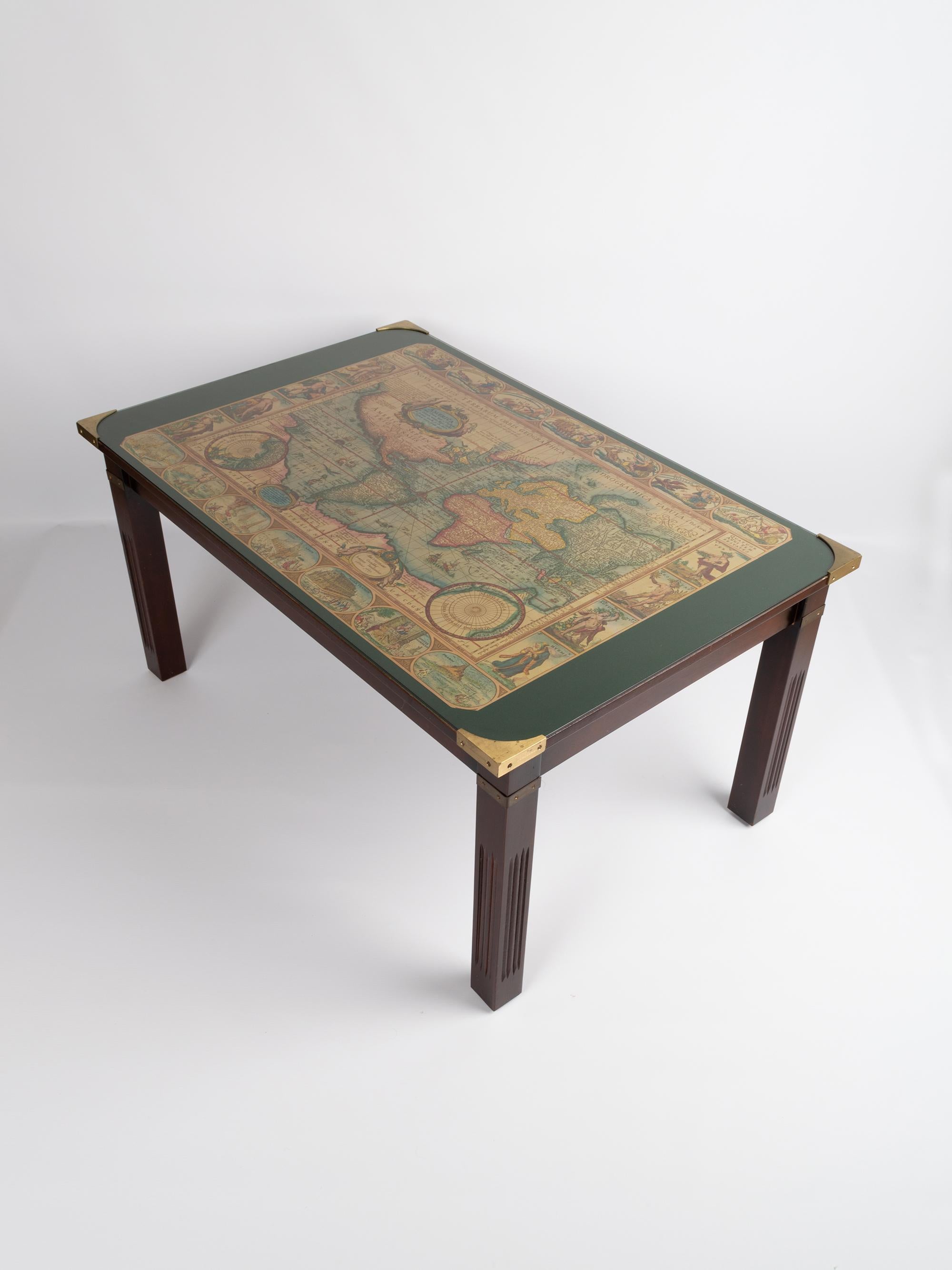 Vintage World Map Military Campaign coffee table by Maison Jansen, France, circa 1960.
Verre églomisé map image with mahogany table frame and brass detailing.
Very good vintage condition commensurate of age.