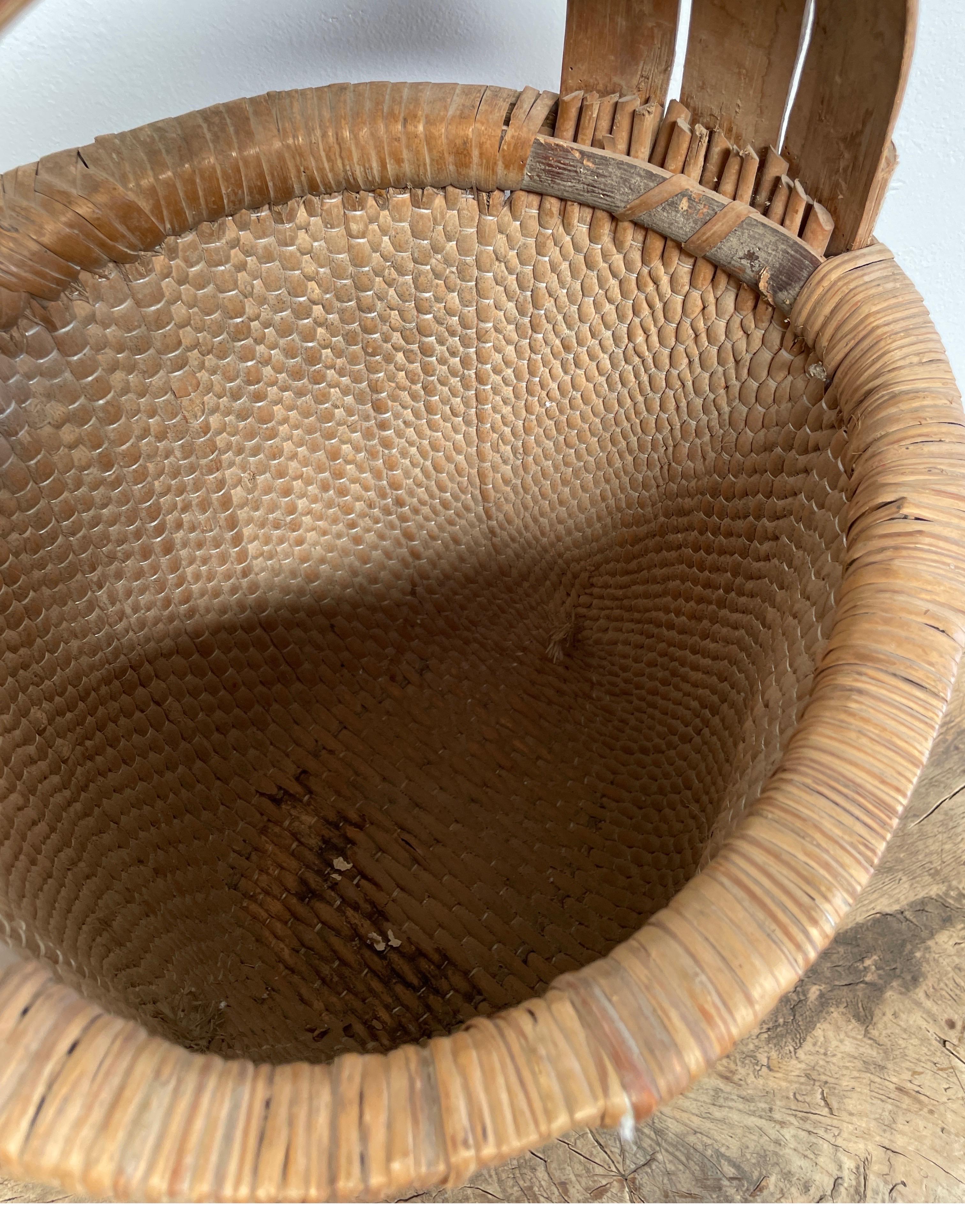 20th Century Vintage Woven Asian Basket with Handle For Sale
