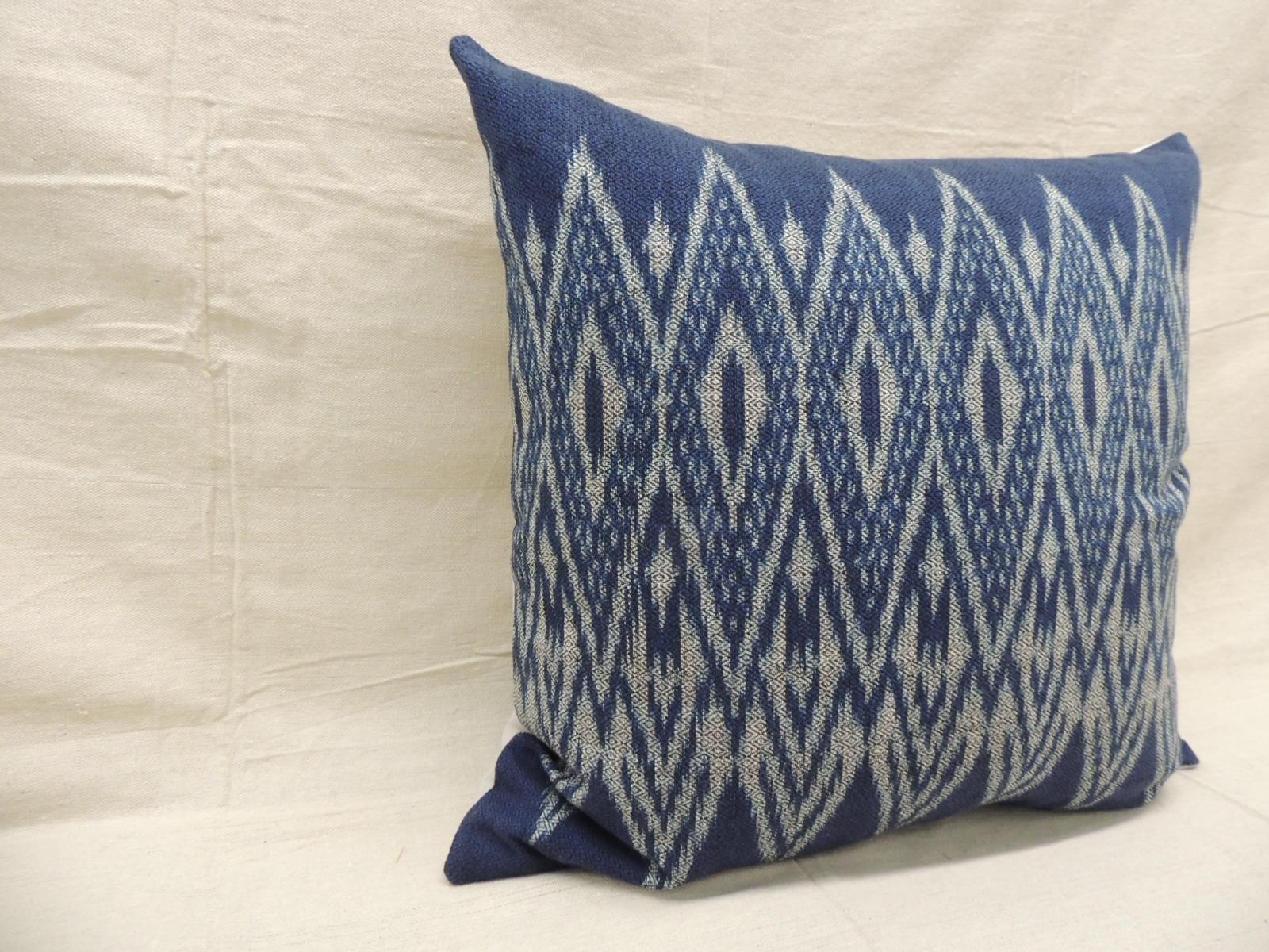 Vintage blue and white Ikat decorative square pillow.
Greyish woven cotton backing.
Decorative pillow handcrafted and designed in the USA. 
Closure by stitch (no zipper closure) with custom made pillow insert.
Size: 20