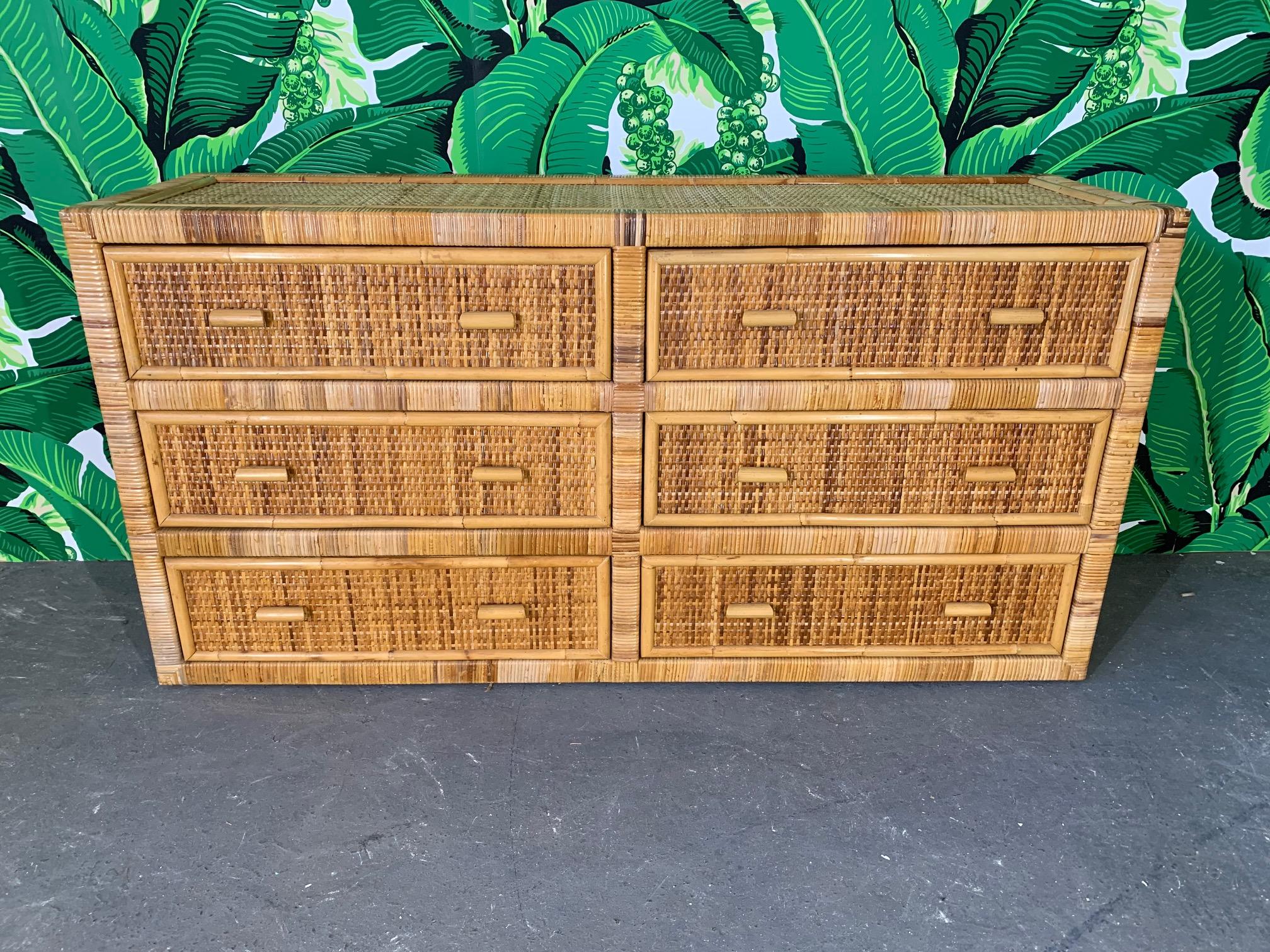 Vintage dresser in wrapped rattan features woven rattan panels and bamboo detailing. Very good vintage condition with minor imperfections consistent with age.