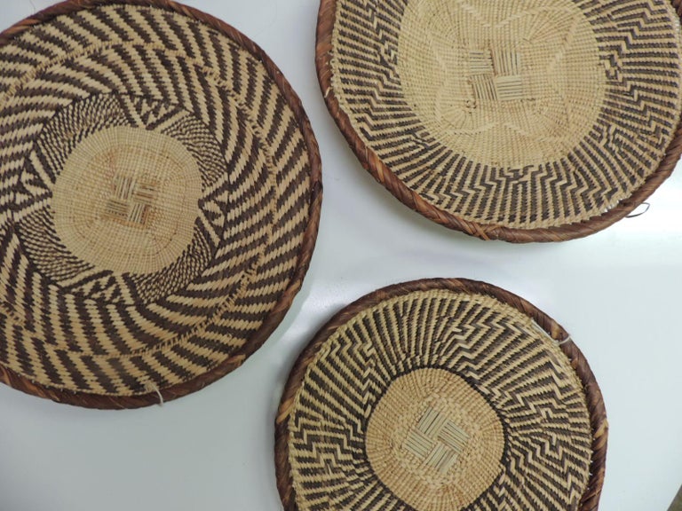 Vintage Woven Seagrass Ethnic Round African Flat Baskets at 1stDibs
