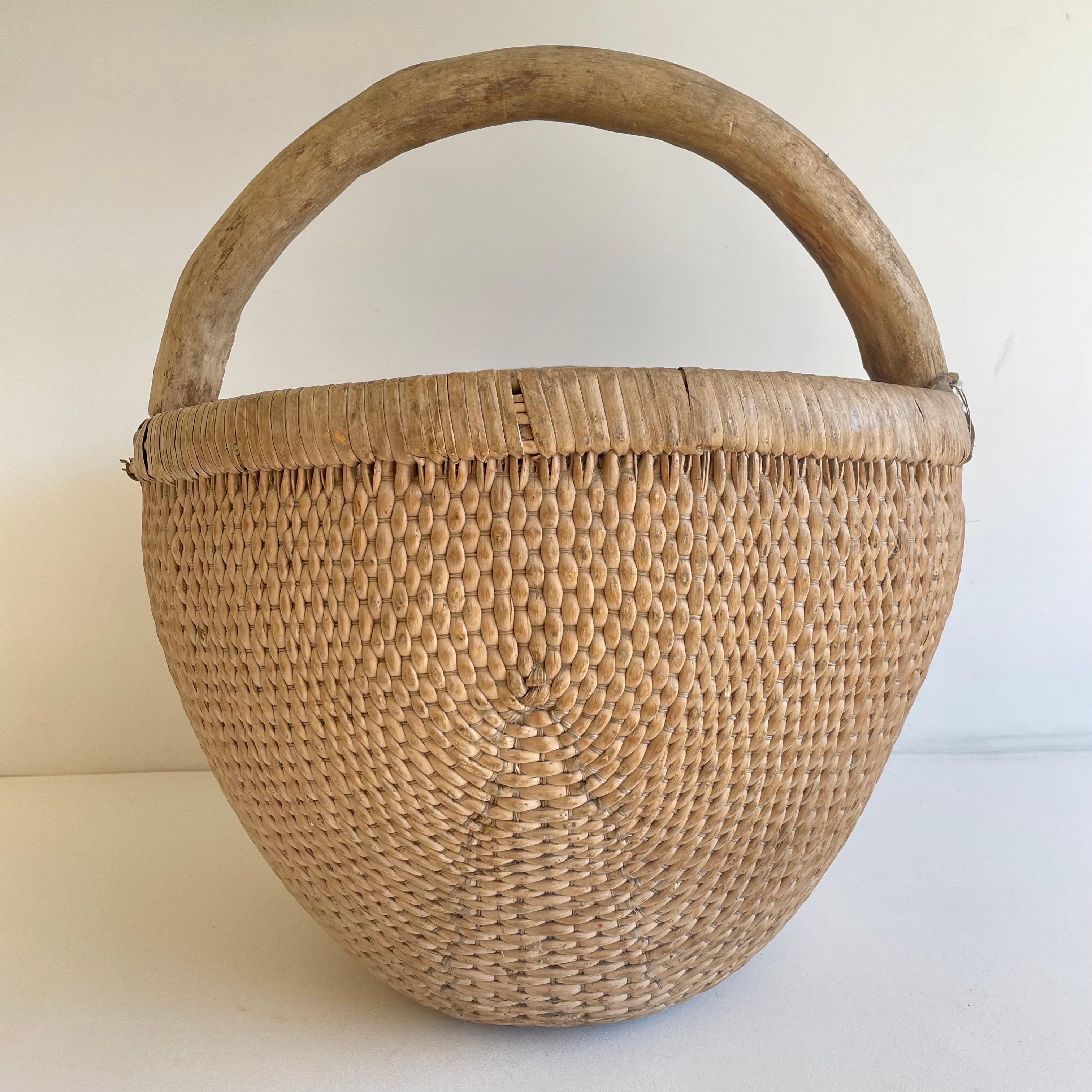 Vintage Woven Wicker Basket with Handle. 
Size: 18”W x 17” x 18 1/2”H 