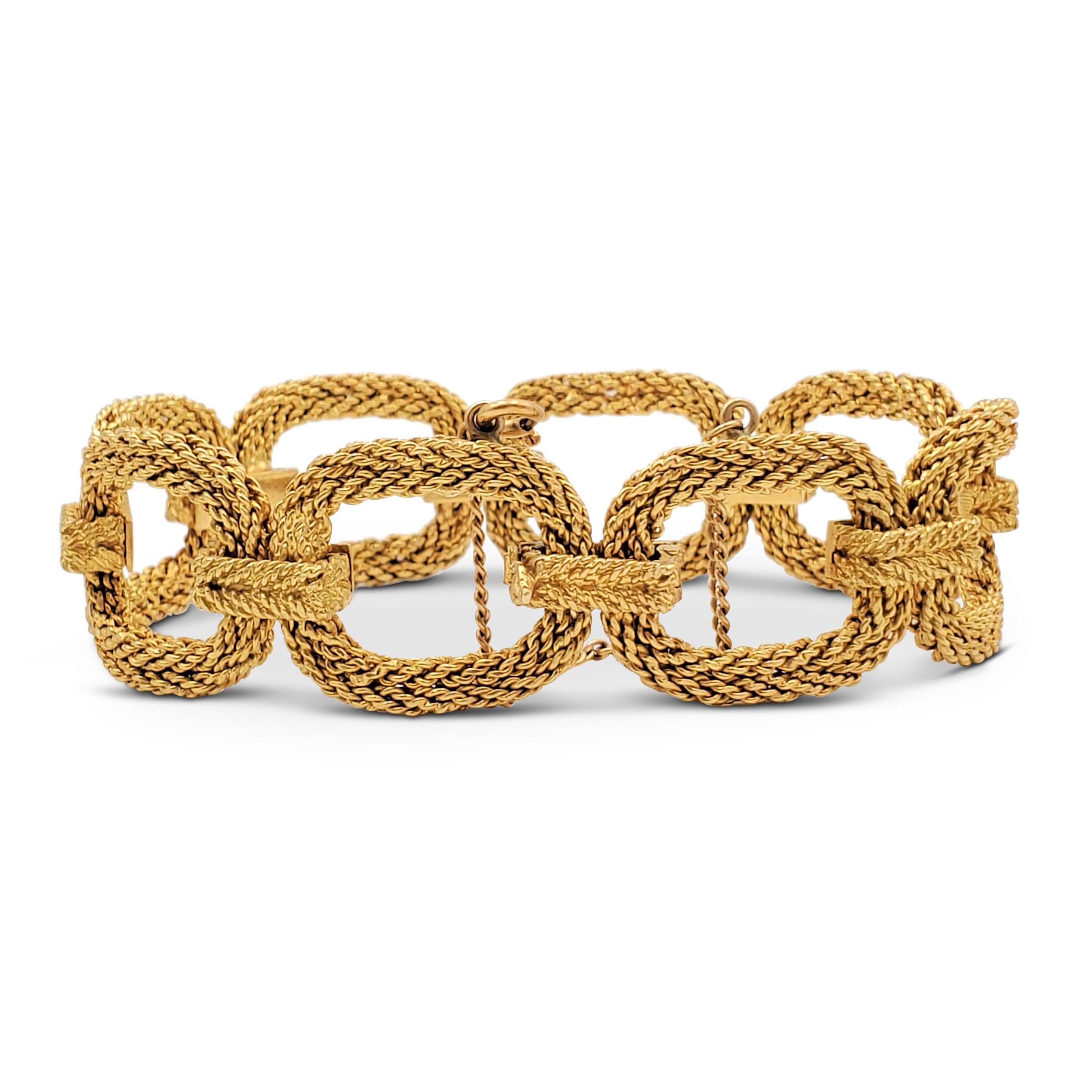 A chic and wearable vintage bracelet crafted in 18 karat woven yellow gold features geometric oval links. French eagle's head hallmark. The bracelet measures 7 1/2 inches in length. Patina consistent with age and wear. The bracelet is not presented