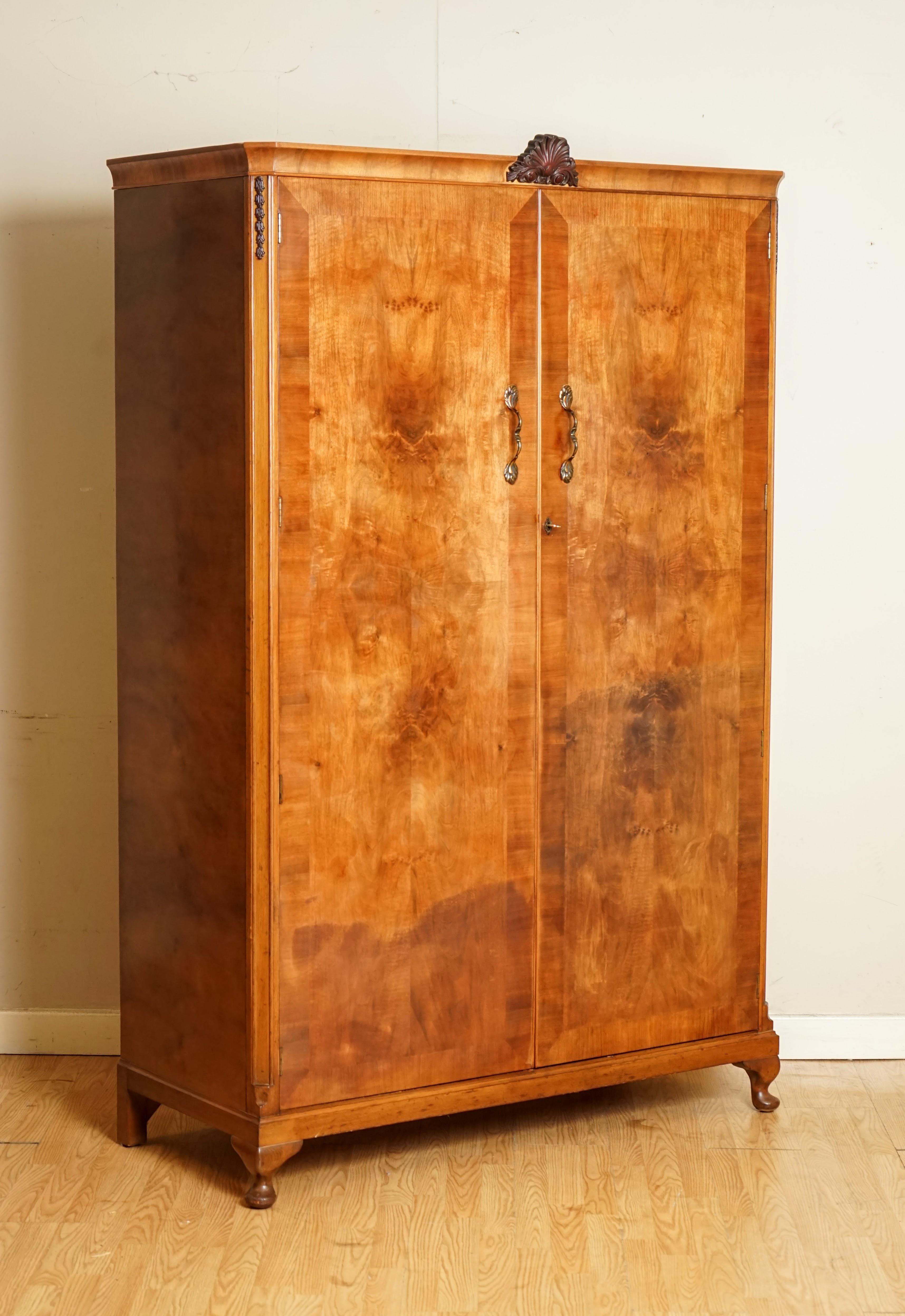 We are so excited to present to you this Beautiful Art Deco Burr Walnut Wardrobe.

A lovely and decorative wardrobe, it has some fading on the from as you will be able to see on the pictures, apart from that, it's in a very good condition.